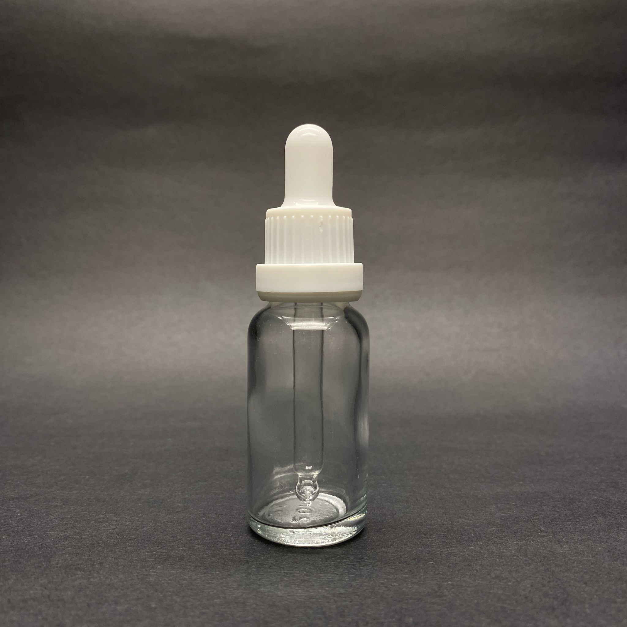 20 CC ŞEFFAF CAM DAMLALIKLI ŞİŞE - BEYAZ EMZİK - BEYAZ KİLİTLİ PLASTİK KAPAK - 20 ML SAYDAM CAM DAMLALIKLI ŞİŞE