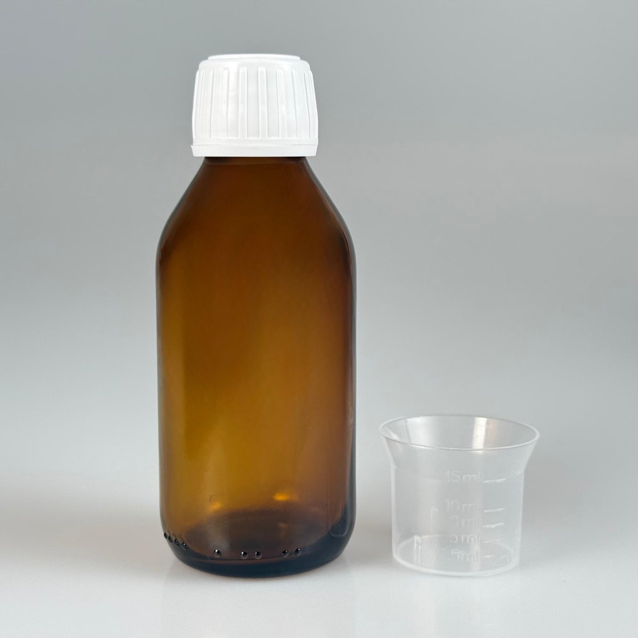 100 CC AMBER CAM ŞİŞE + BEYAZ KİLİTLİ KAPAKLI -+ 15 ML ÖLÇEK TAKIM - 100 ML KAHVERENGİ BOŞ ŞURUP ŞİŞESİ (AĞIZ ÇAPI 25 MM)