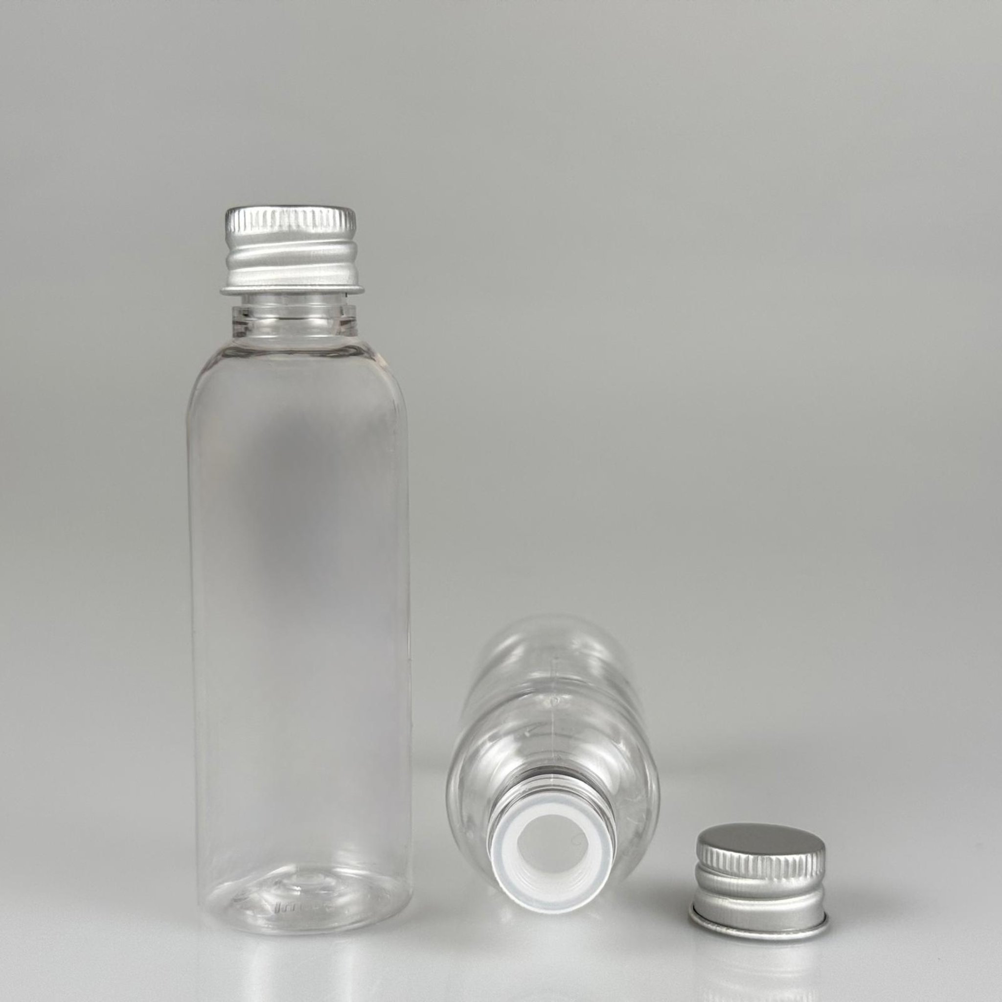 50 CC ŞEFFAF SİLİNDİR UZUN MODEL PET ŞİŞE + KÖPÜK CONTALI GÜMÜŞ ALÜMİNYUM METAL KAPAKLI + KÖR TIPALI TAKIM - 50 ML PLASTİK ŞİŞE
