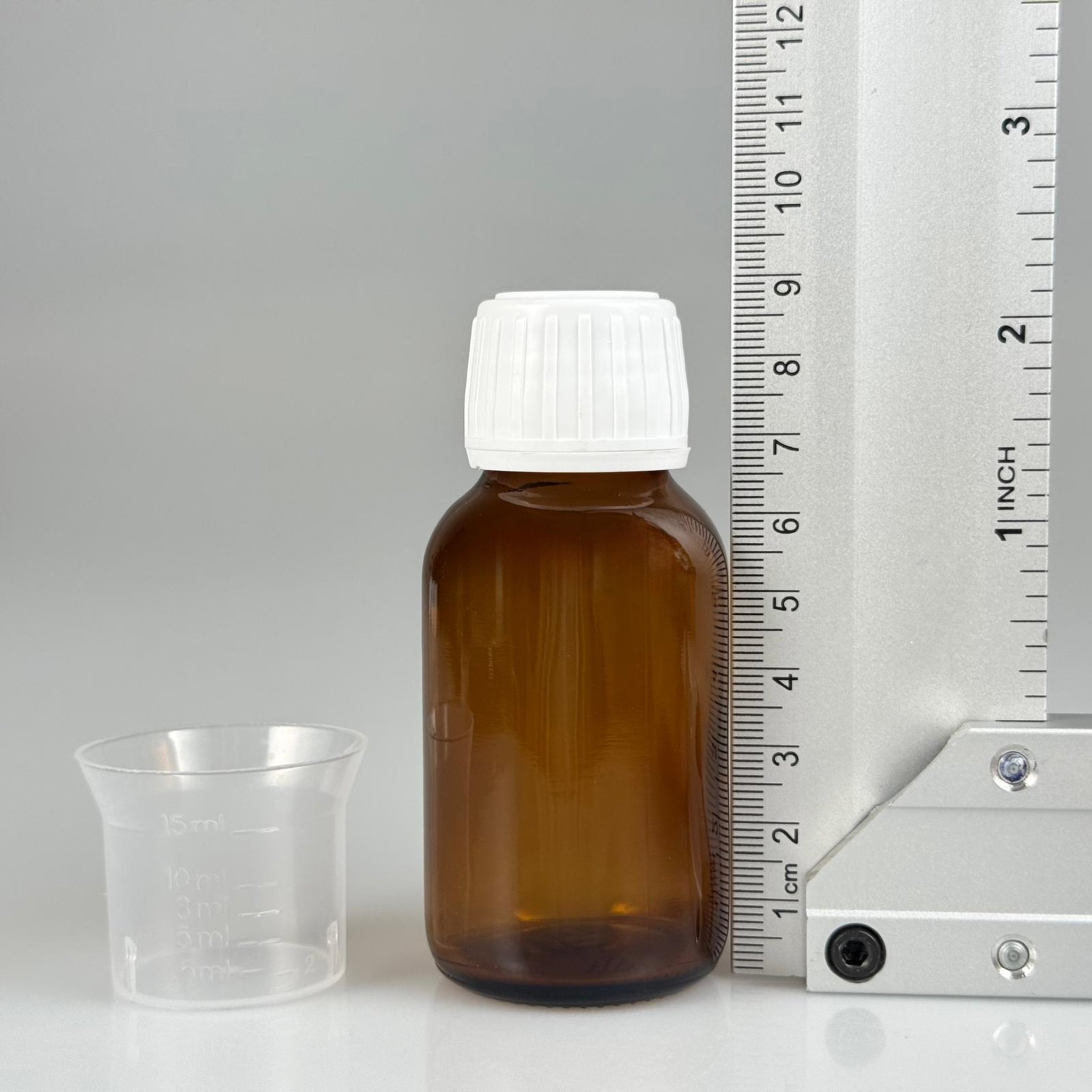 50 CC AMBER CAM ŞİŞE + BEYAZ KİLİTLİ KAPAKLI + 15 ML ÖLÇEK TAKIM - 50 ML KAHVERENGİ BOŞ ŞURUP ŞİŞESİ (AĞIZ ÇAPI 25 MM) - 50 ML ECZA ŞİŞESİ