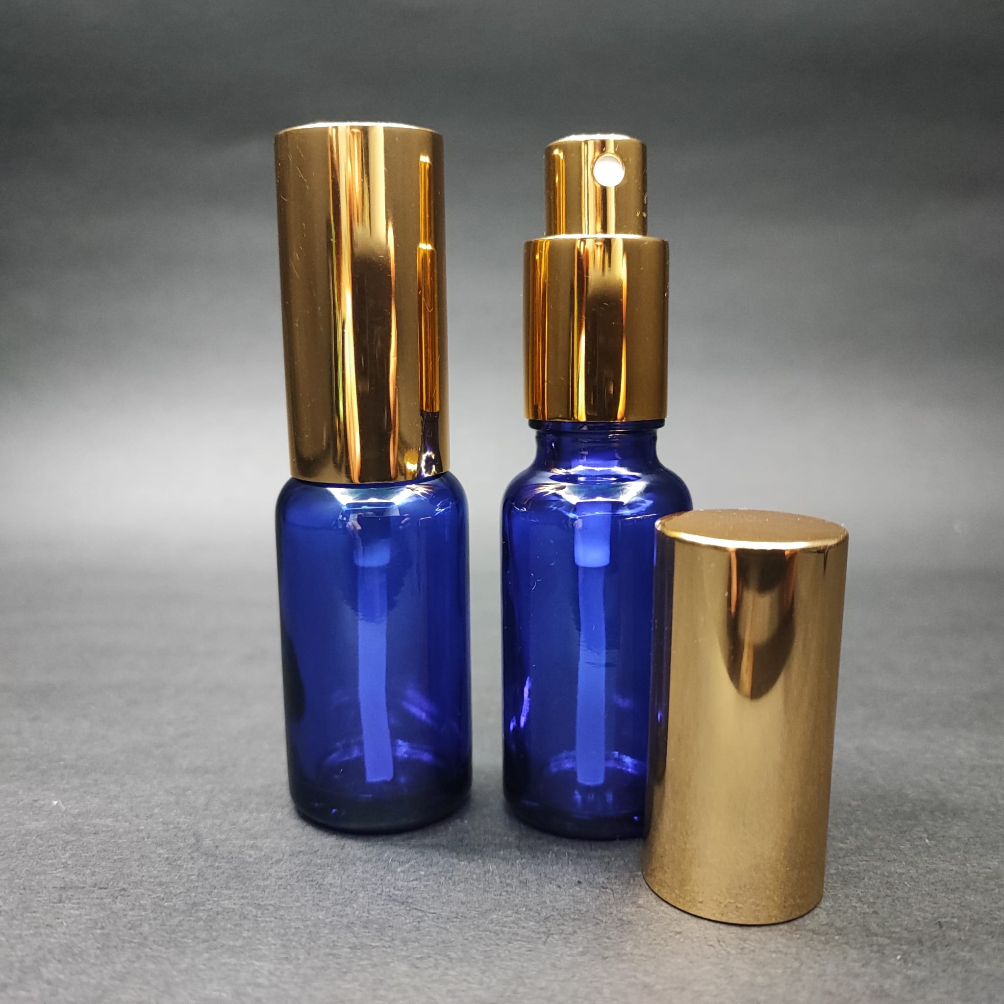 20 ML LÜKS VİDALI VALF ÇEVİRME PARFÜM ŞİŞELERİ - 20 CC MAVİ CAM ŞİŞE - GOLD METAL SPREYLİ KAPAKLI SET