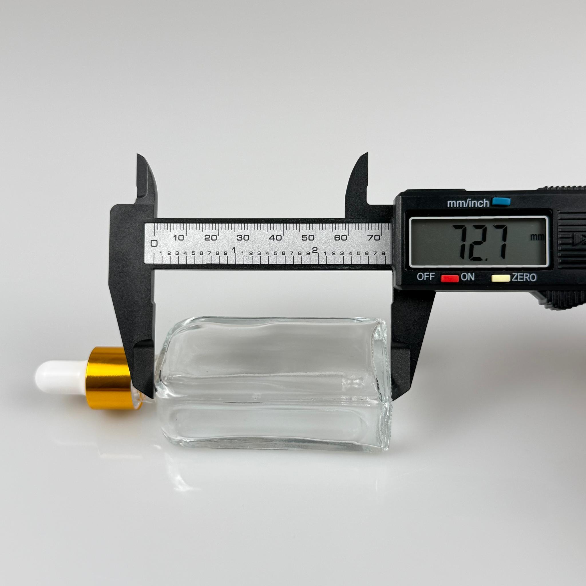 50 CC YASSI DİKDÖRTGEN PRESTİJLİ CAM DAMLALIKLI ŞİŞE - BEYAZ EMZİK - GOLD METALİK KAPAK - 50 ML CAM DAMLALIKLI ŞİŞE - DAMLALIKLI BOŞ ŞİŞE
