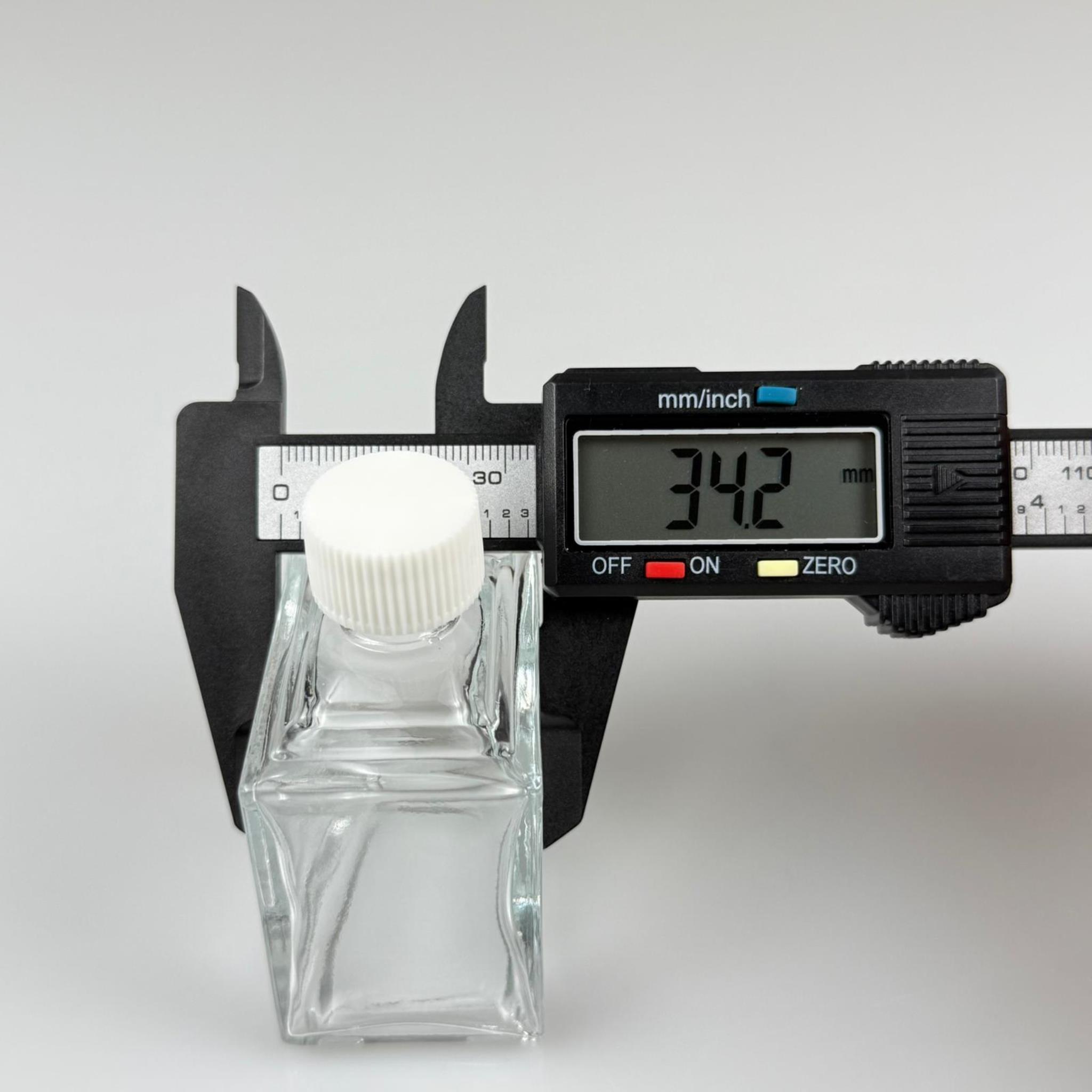50 CC KÖŞELİ PRİZMA CAM ŞİŞE - BEYAZ PLASTİK KAPAKLI - 50 ML PRESTİJLİ ŞİŞE