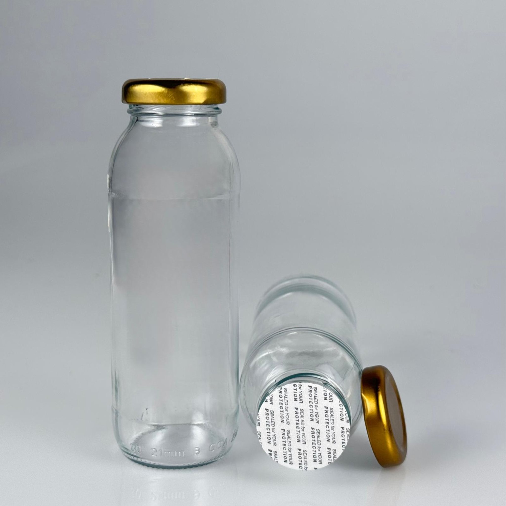 250 CC CAM KONSERVE ŞİŞESİ - GOLD METAL KAPAKLI + KENDİNDEN YAPIŞKANLI SIZDIRMAZ CONTALI TAKIM - 250 ML CAM MEYVE SUYU ŞİŞESİ - ŞİŞECAM KODU 412825 İLE EŞDEĞERDİR.