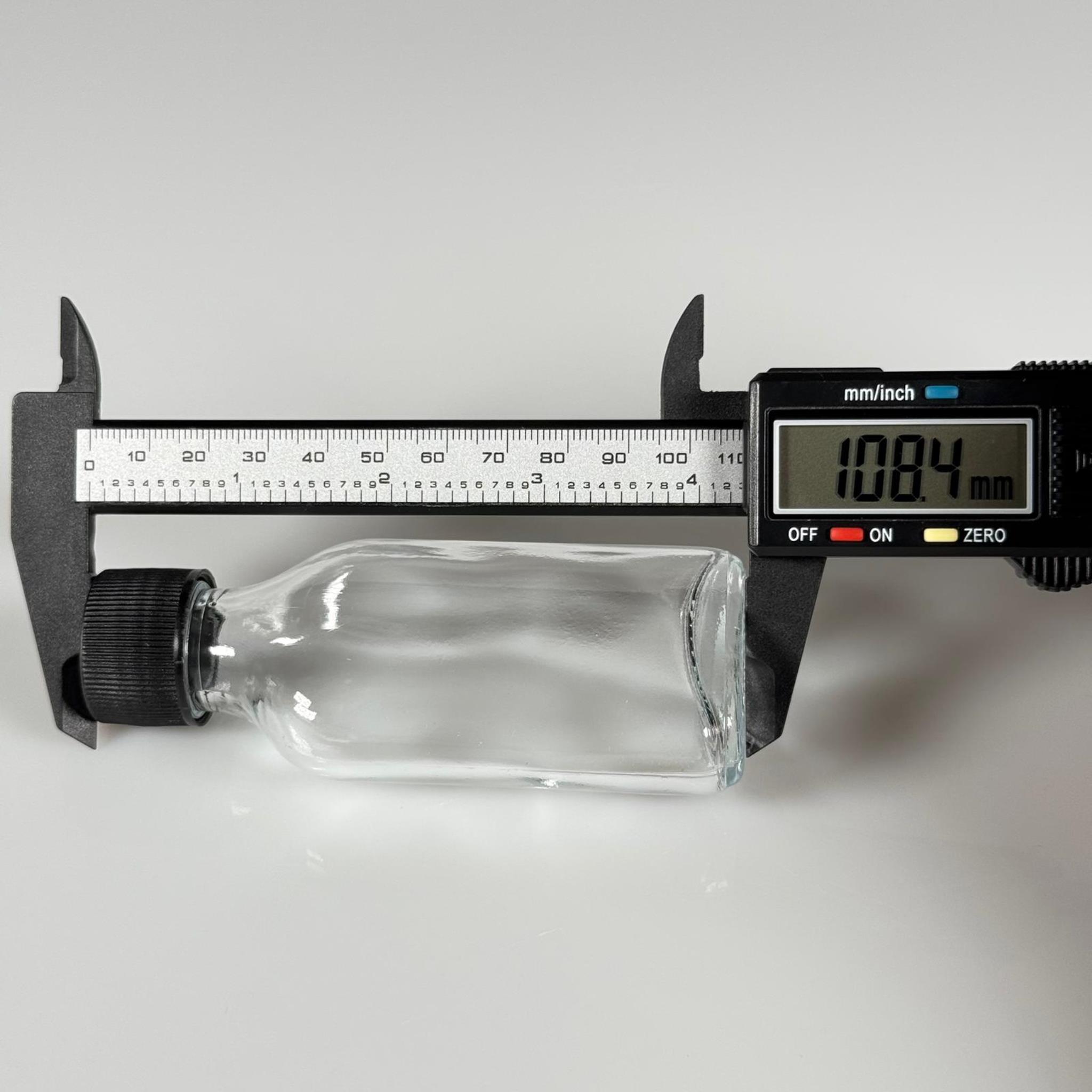 50 CC YASSI CAM ŞİŞE - SİYAH PLASTİK KAPAKLI KOLONYA TIPALI - 50 ML COLD BREW KOLONYA CAM ŞİŞESİ (TIPA İLE KULLANMAK İÇİN KAPAK CONTASI ÇIKARILIR)