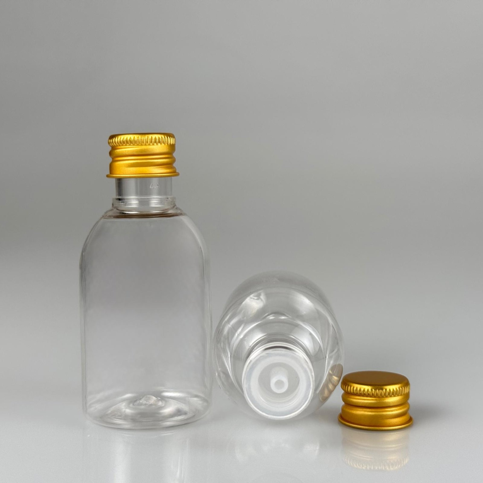 50  CC BUKLET PET ŞİŞE + KÖPÜK CONTALI GOLD ALÜMİNYUM METAL KAPAKLI + DAMLALIKLI KOLONYA TIPALI TAKIM - 50 ML PLASTİK ŞİŞE