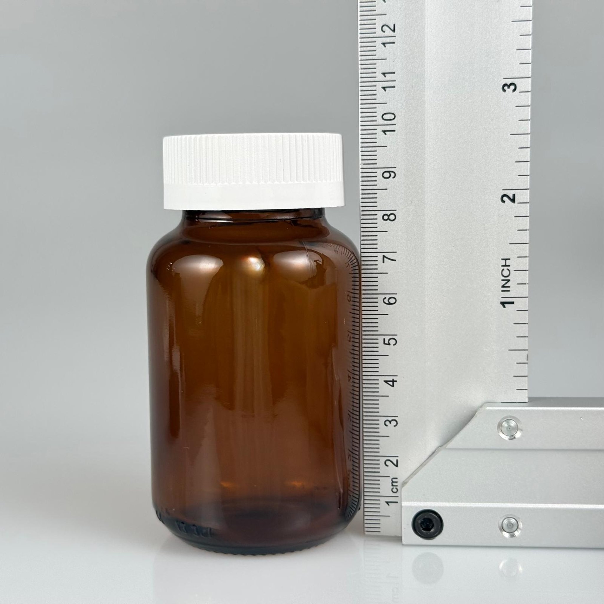 120 CC AMBER CAM TABLET ŞİŞESİ + 38 BEYAZ ÇOCUK KİLİTLİ KAPAK + KÖPÜK CONTALI TAKIM - 120 ML (SİLME 133 ML) KAPSÜL KUTUSU - İLAÇ ŞİŞESİ - MEDİKAL HAP ŞİŞESİ - FARMASÖTİK KAVANOZ