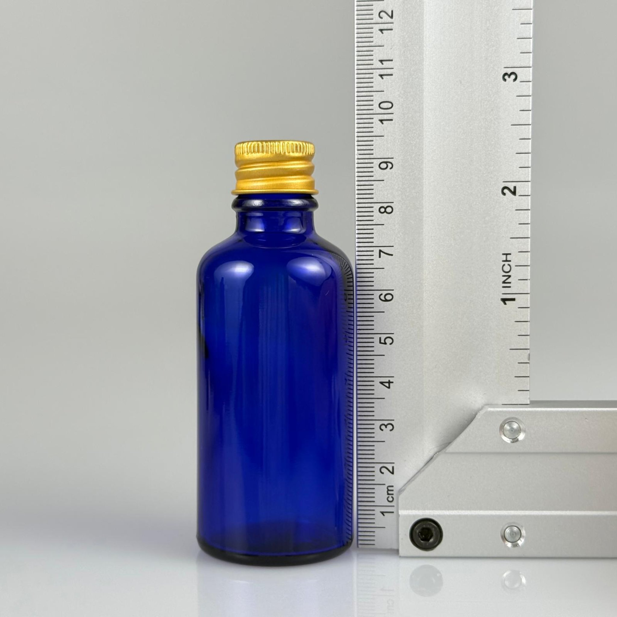 50 CC MAVİ CAM ŞİŞE + KÖPÜK CONTALI GOLD ALÜMİNYUM METAL KAPAKLI + KÖR TIPALI TAKIM - 50 ML MAVİ CAM ŞİŞE