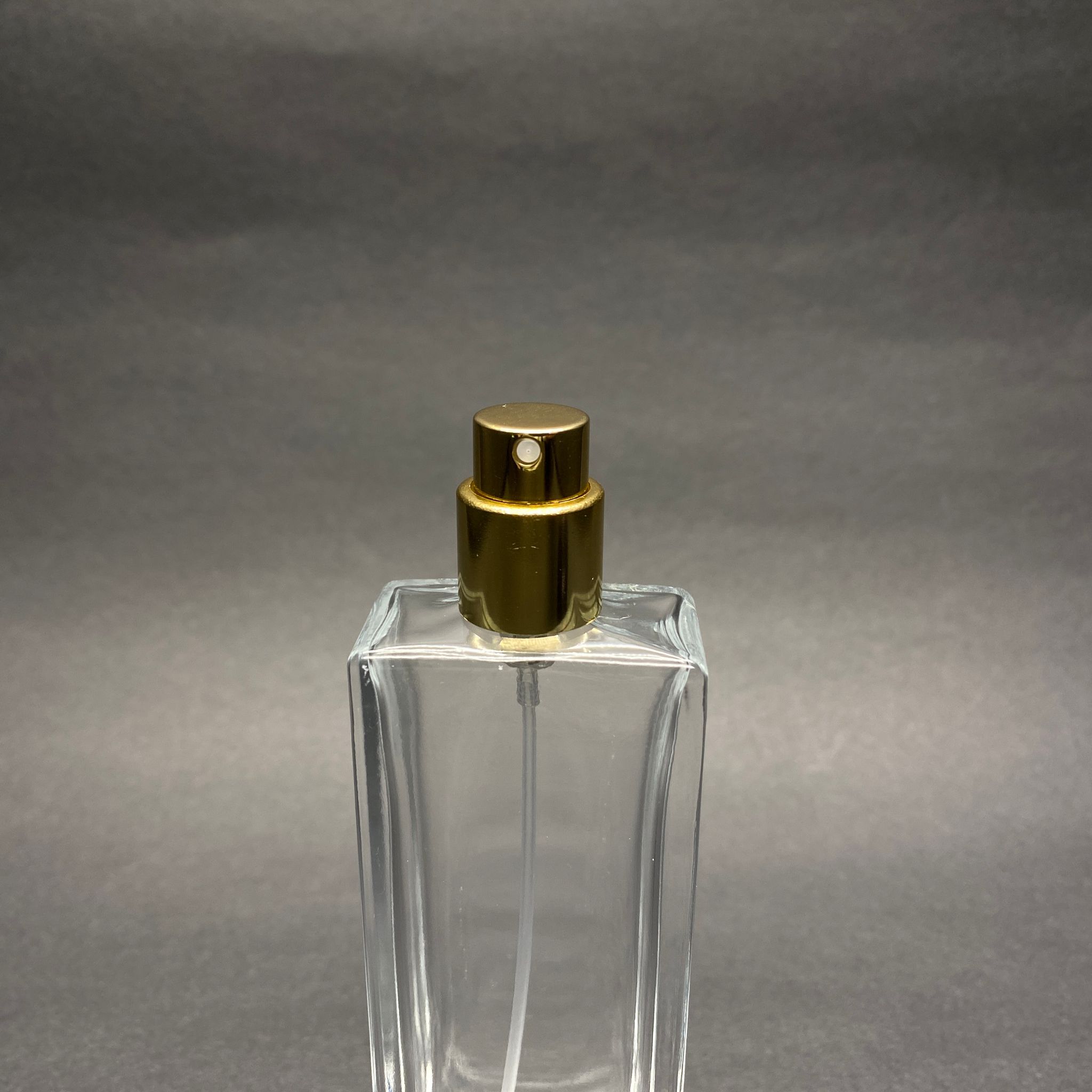 50 ML DİKDÖRTGEN MODEL FORTUNE UZUN PARFÜM ŞİŞESİ - GOLD METAL SPREYLİ (AĞIZ 15 MM GEÇME KOLAY KAPAMA)