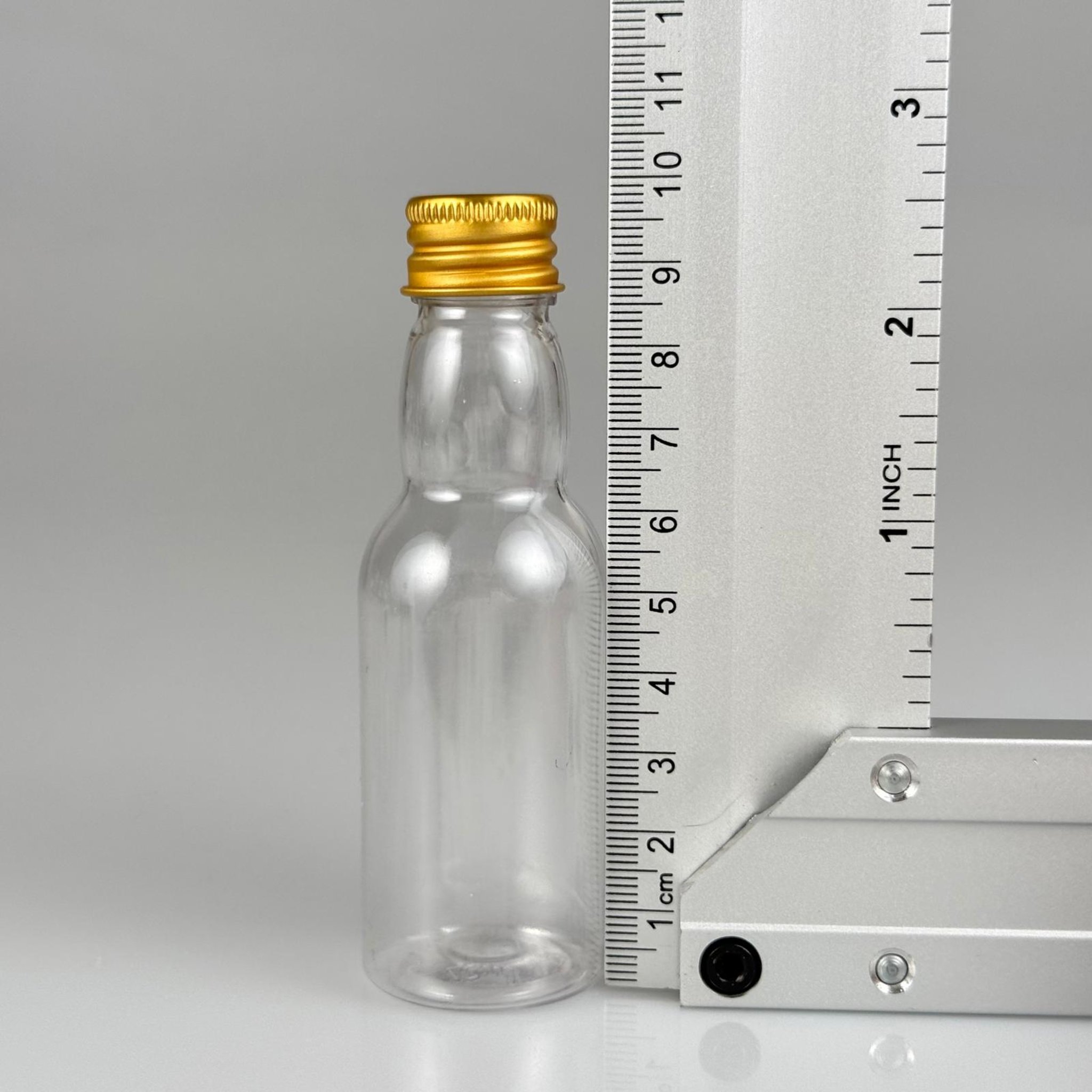 40 CC ŞEFFAF UZUN BOĞAZLI PET ŞİŞE + KÖPÜK CONTALI GOLD ALÜMİNYUM METAL KAPAKLI + DAMLALIKLI KOLONYA TIPALI TAKIM - 40 ML BOĞAZLI PET ŞİŞE