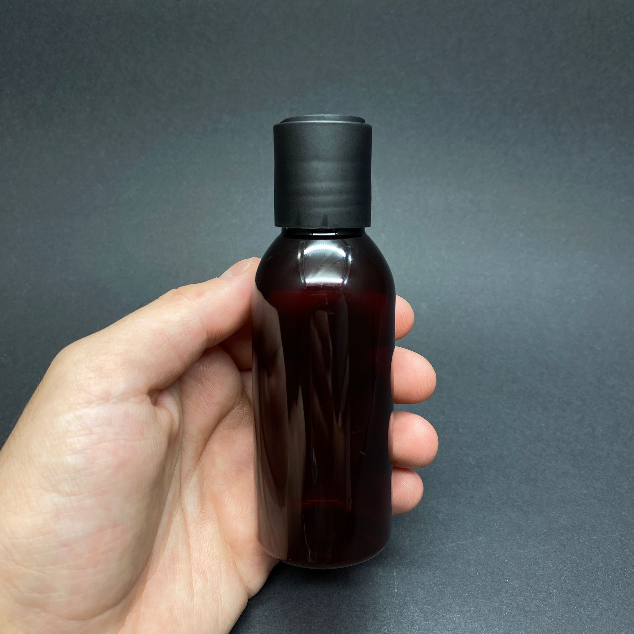 100 CC AMBER OVAL BOYUNLU PET ŞAMPUAN ŞİŞESİ -  100 ML SİYAH DİSKTOP ŞAMPUAN KAPAKLI