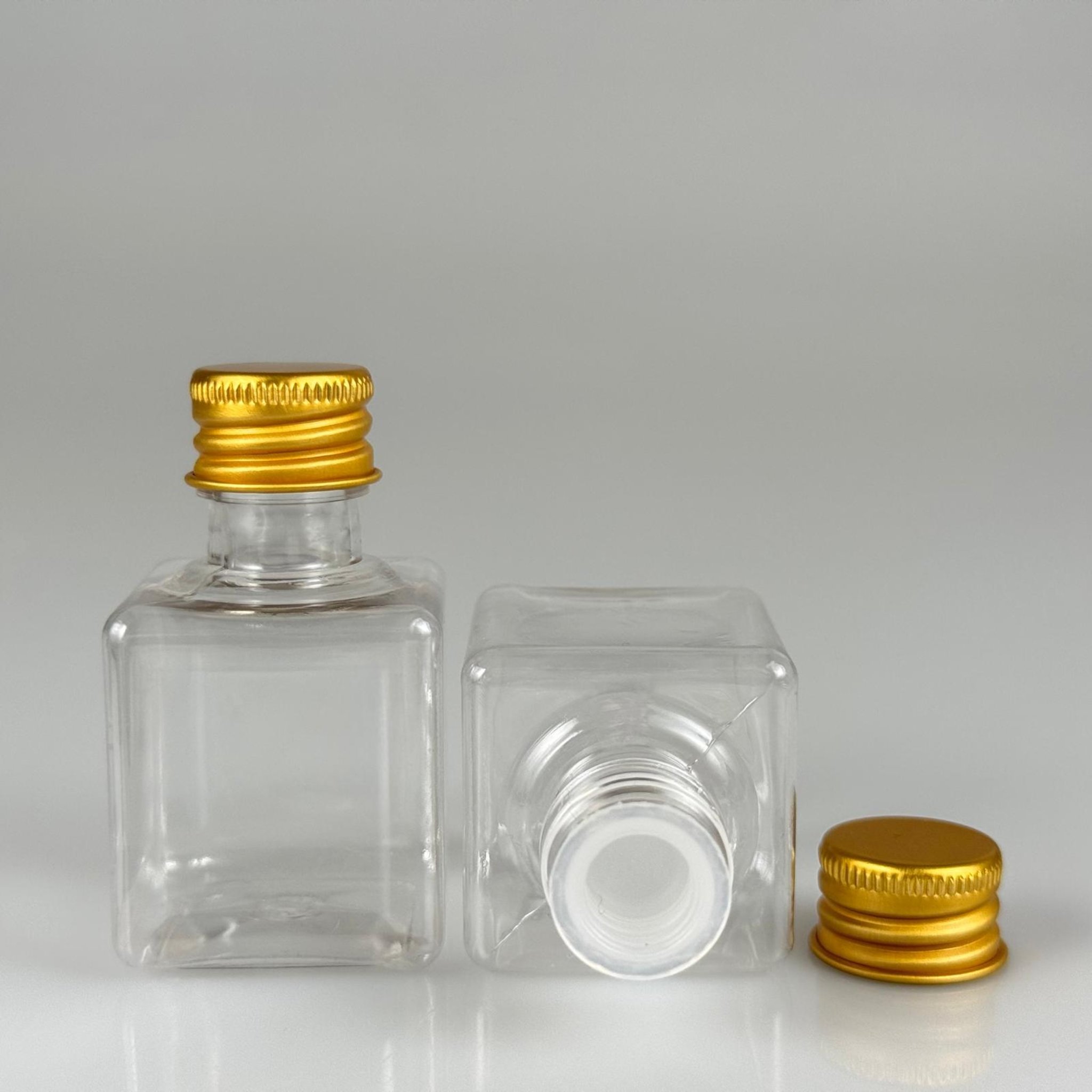 35 CC ŞEFFAF KARE PET ŞİŞE - KÖPÜK CONTALI GOLD ALÜMİNYUM METAL KAPAKLI + KÖR TIPALI TAKIM - 35 ML ŞEFFAF KARE PET ŞİŞE