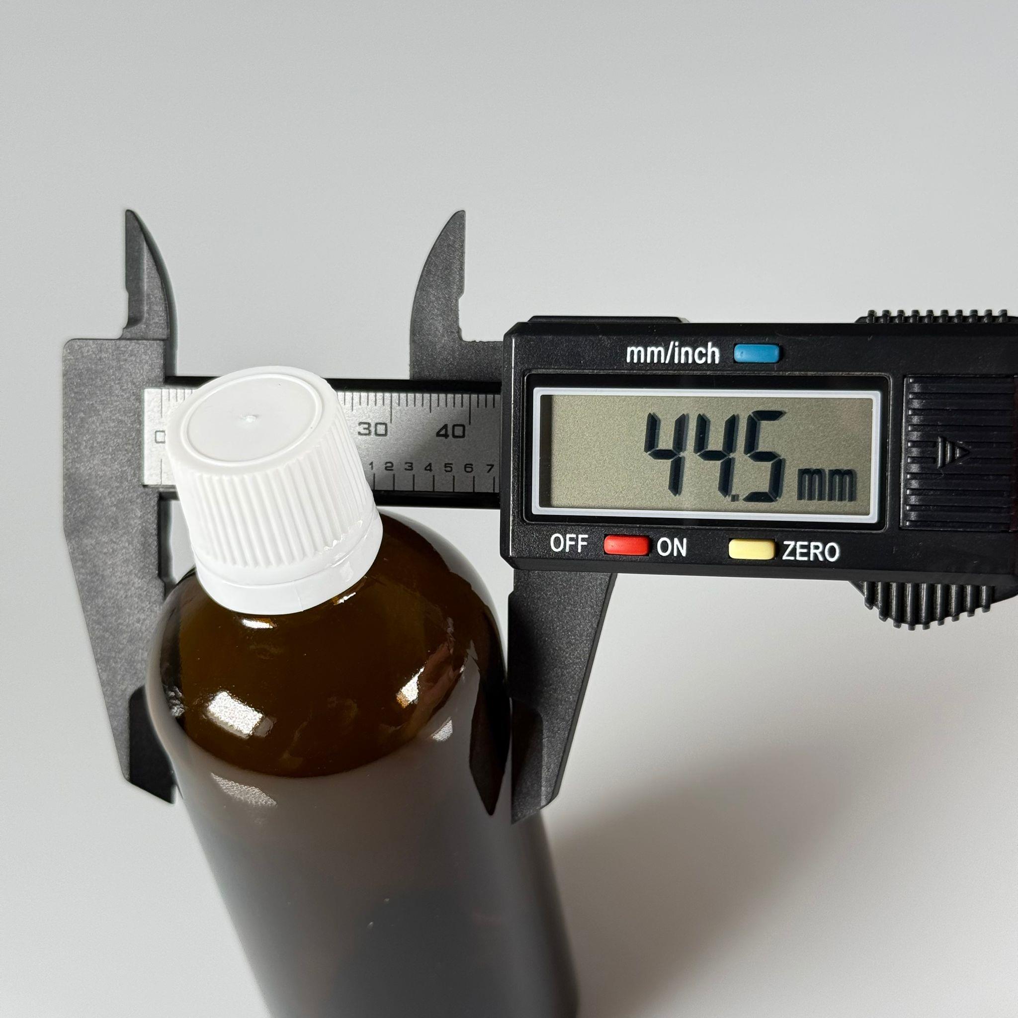 100 CC CAM AMBER KAHVERENGİ KİLİTLİ, KENDİNDEN CONTALI BEYAZ KAPAKLI - 100 ML DAR AĞIZLI İLAÇ ŞİŞESİ