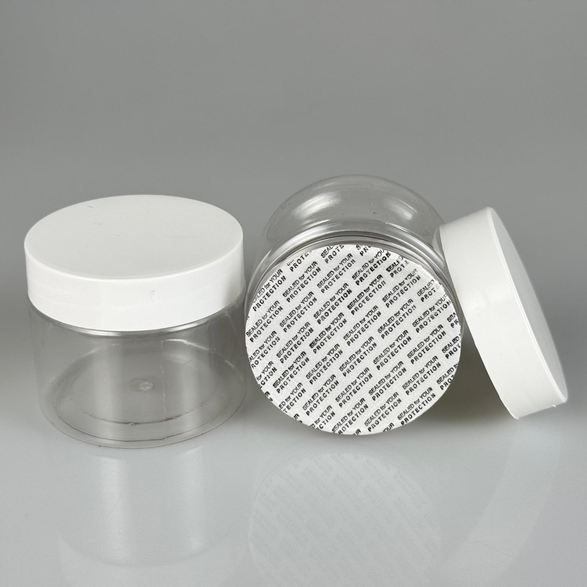 100 CC PET KAVANOZ + BEYAZ PLASTİK KAPAKLI + KENDİNDEN YAPIŞKANLI KÖPÜK CONTALI TAKIM - 100 ML PLASTİK KAVANOZ