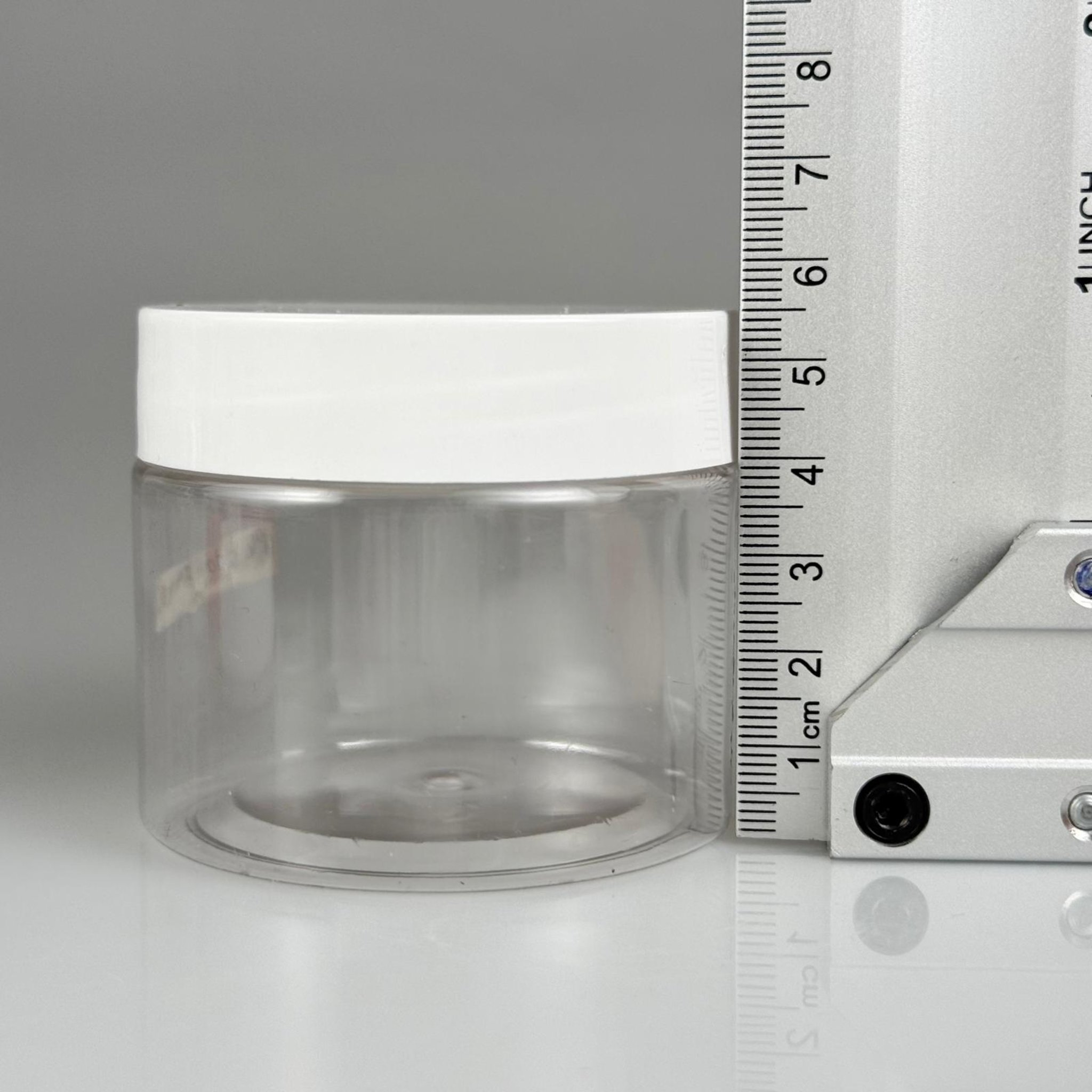 100 CC PET KAVANOZ + BEYAZ PLASTİK KAPAKLI + KENDİNDEN YAPIŞKANLI KÖPÜK CONTALI TAKIM - 100 ML PLASTİK KAVANOZ