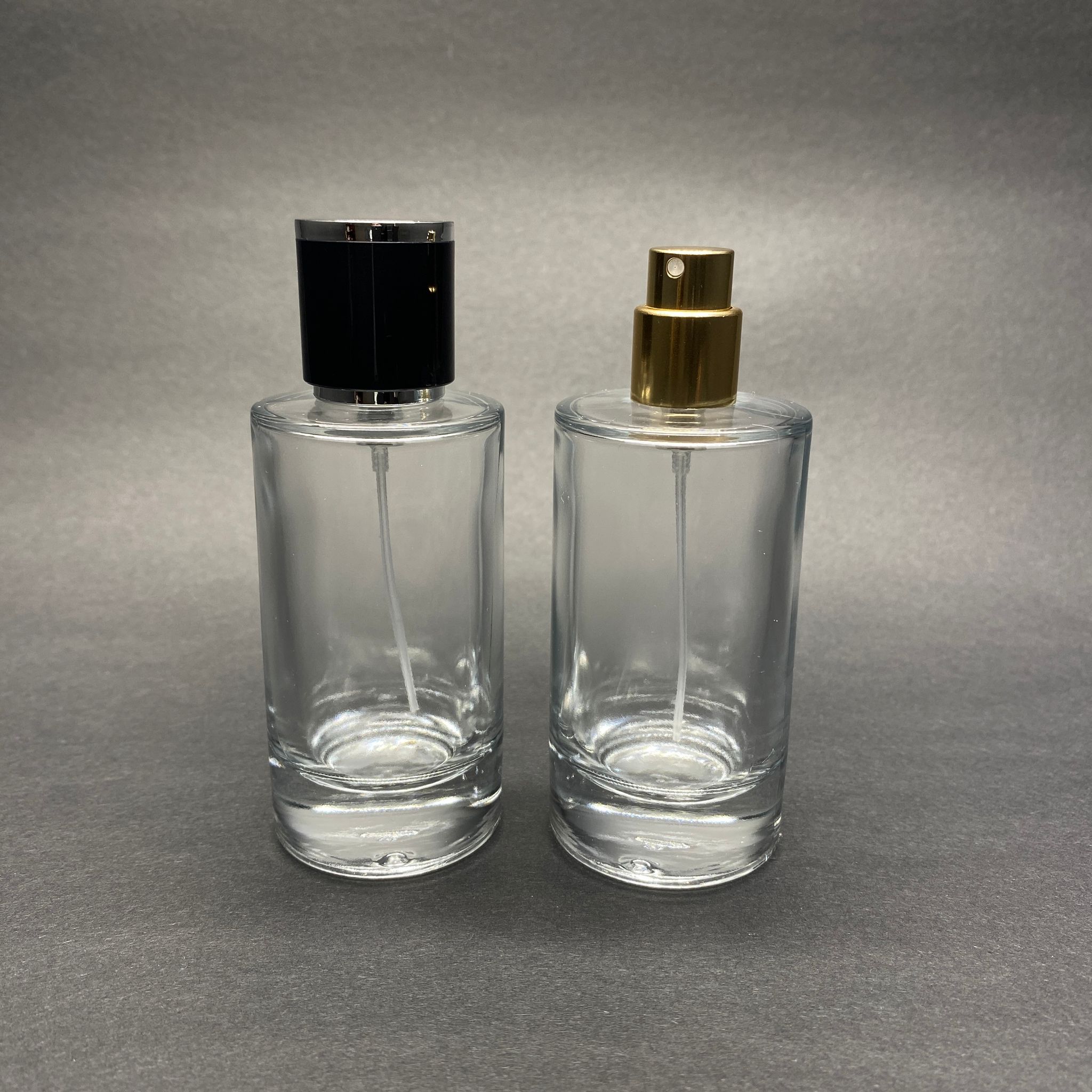 50 ML SİLİNDİR MODEL MARS PARFÜM ŞİŞESİ - GOLD METAL SPREYLİ + GÜMÜŞ SİYAH KAPAKLI (AĞIZ 15 MM GEÇME KOLAY KAPAMA)