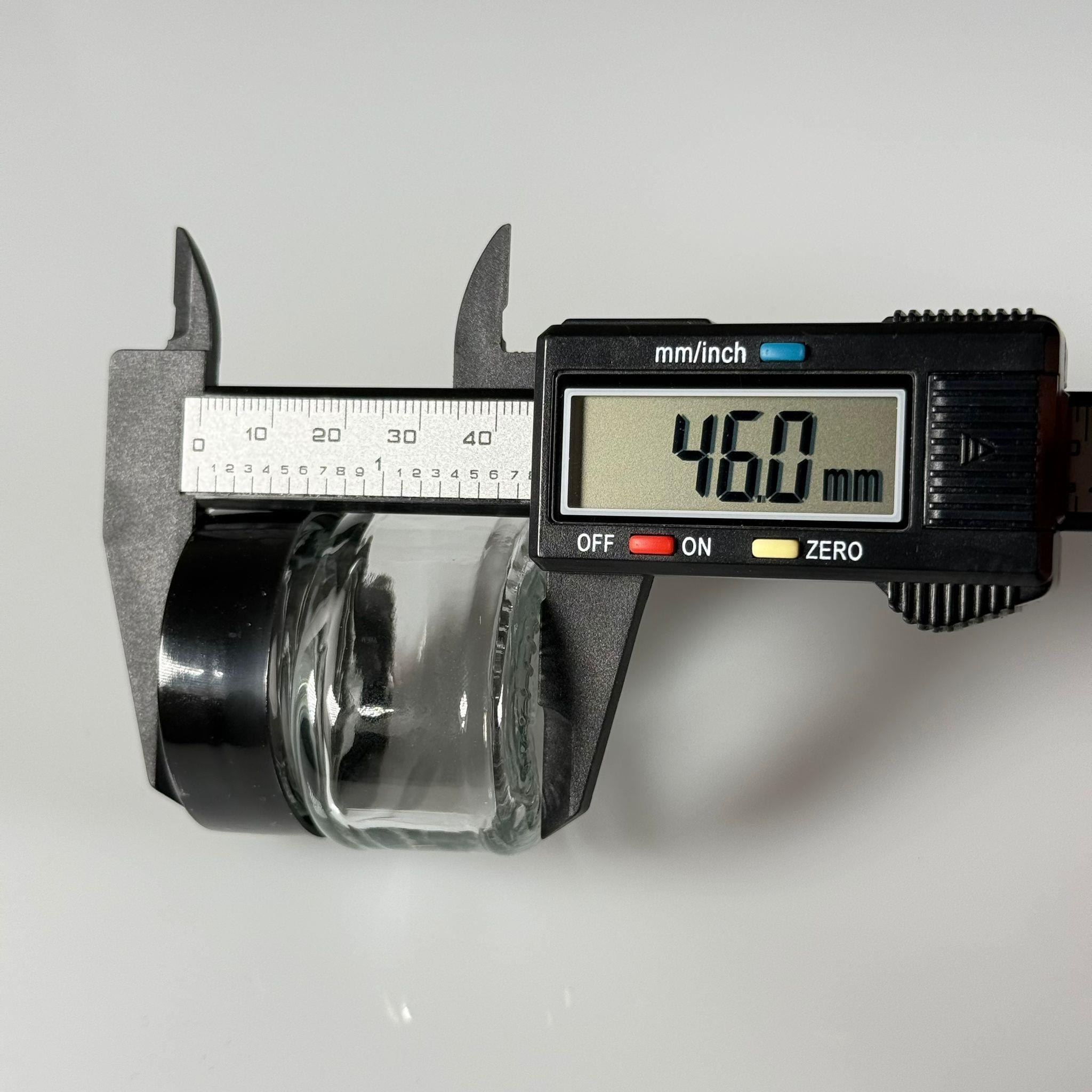 40 CC ELİPS OVAL CAM KAVANOZ - SİYAH PLASTİK DERİN ÜSTÜ KUMLAMA KAPAKLI + KENDİNDEN YAPIŞKANLI KÖPÜK CONTALI - 40 ML MİNİ KREM  CAM KAVANOZLARI