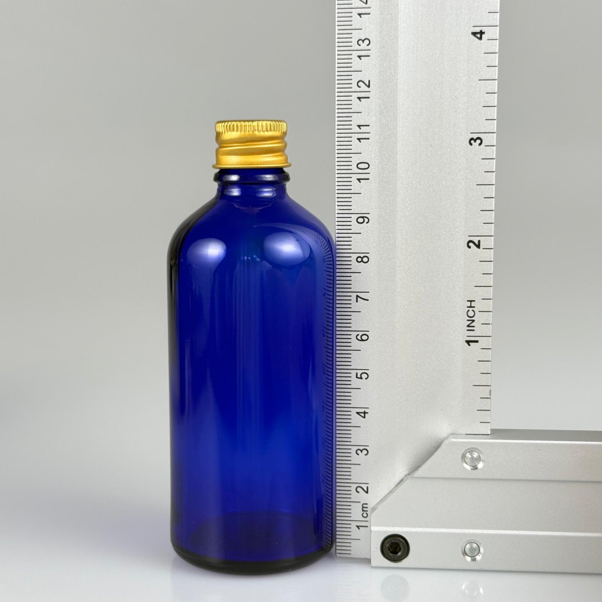 100 CC MAVİ CAM ŞİŞE + KÖPÜK CONTALI GOLD ALÜMİNYUM METAL + KOLONYA TIPALI KAPAKLI TAKIM - 100 ML MAVİ CAM ŞİŞE