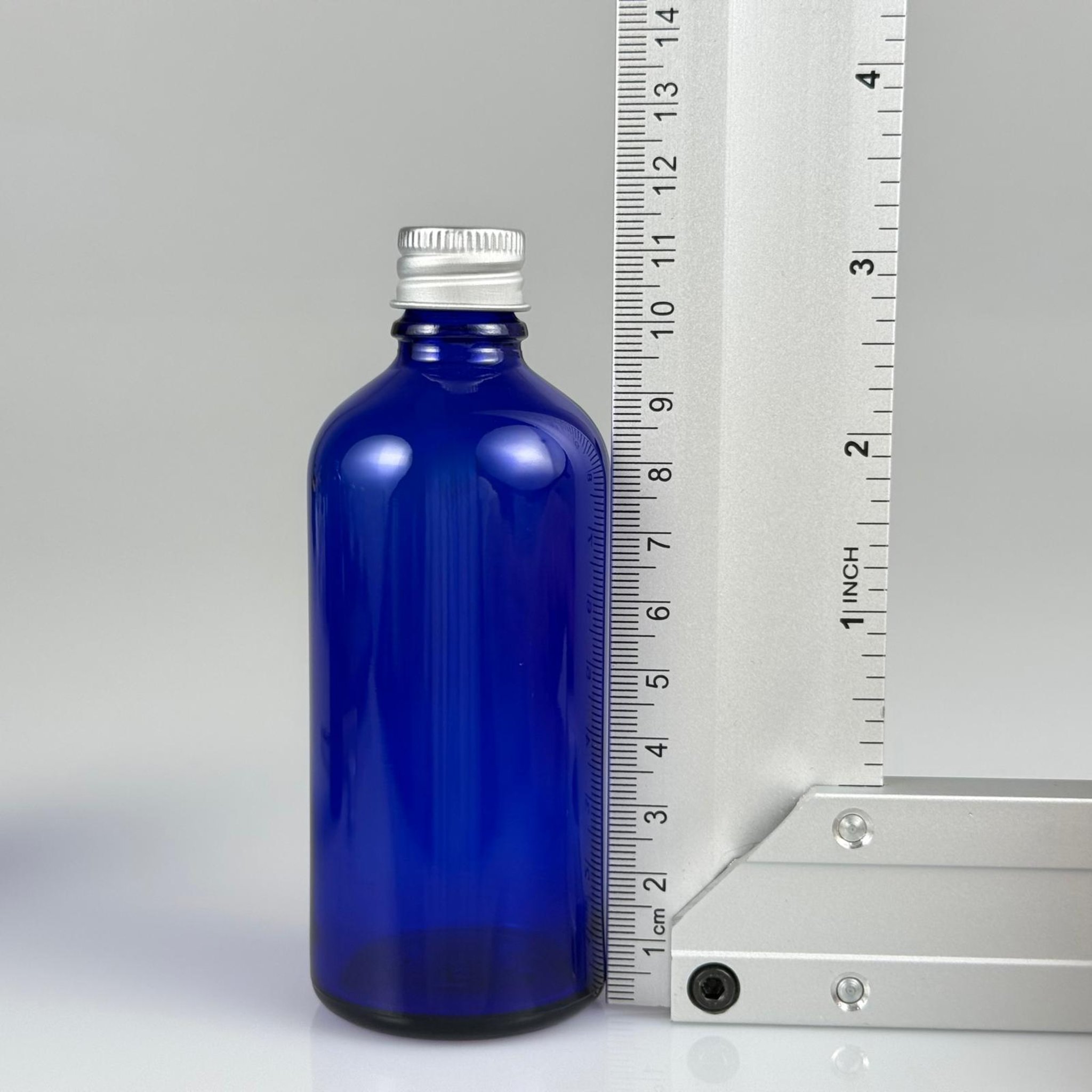 100 CC MAVİ CAM ŞİŞE + KÖPÜK CONTALI GÜMÜŞ ALÜMİNYUM METAL + KOLONYA TIPALI KAPAKLI TAKIM - 100 ML MAVİ CAM ŞİŞE