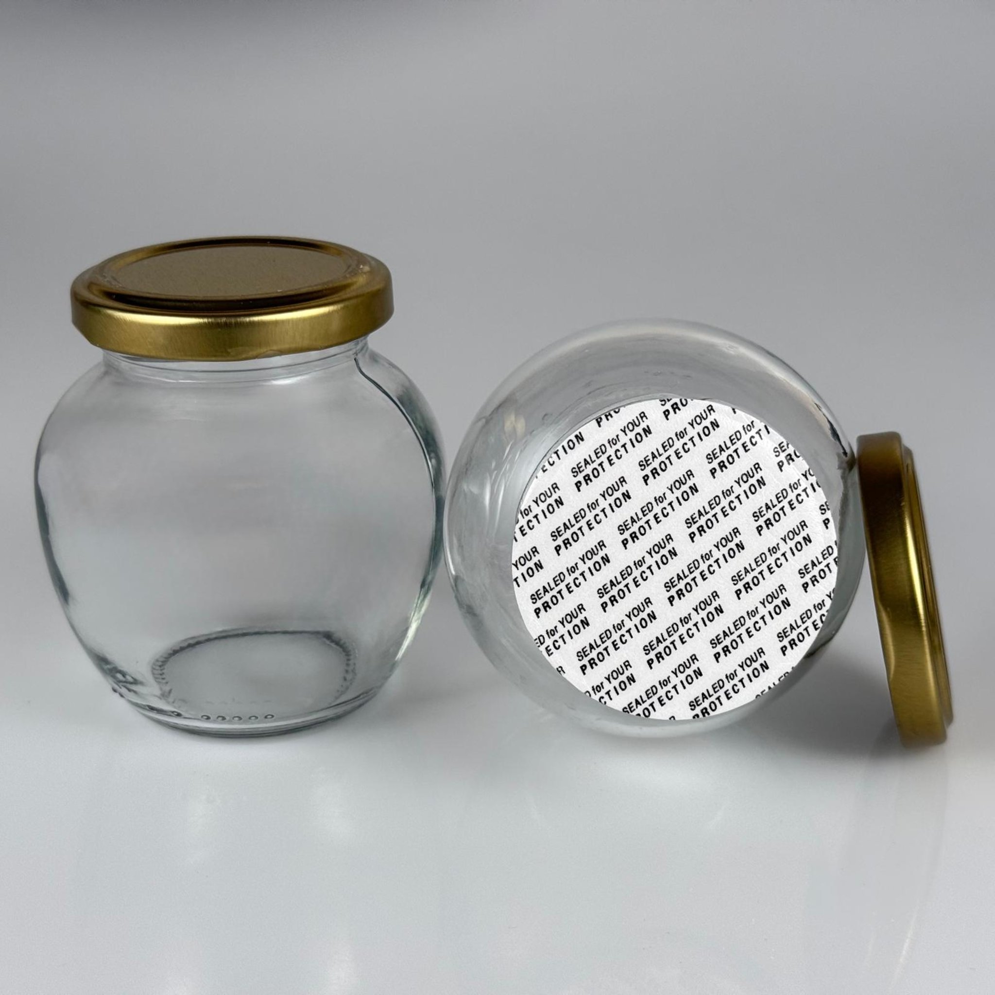 210 CC YUMURTA KAVANOZ - GOLD METAL KAPAKLI + KENDİNDEN YAPIŞKANLI KÖPÜK CONTALI TAKIM - 210 ML OVAL TİP CAM KAVANOZ