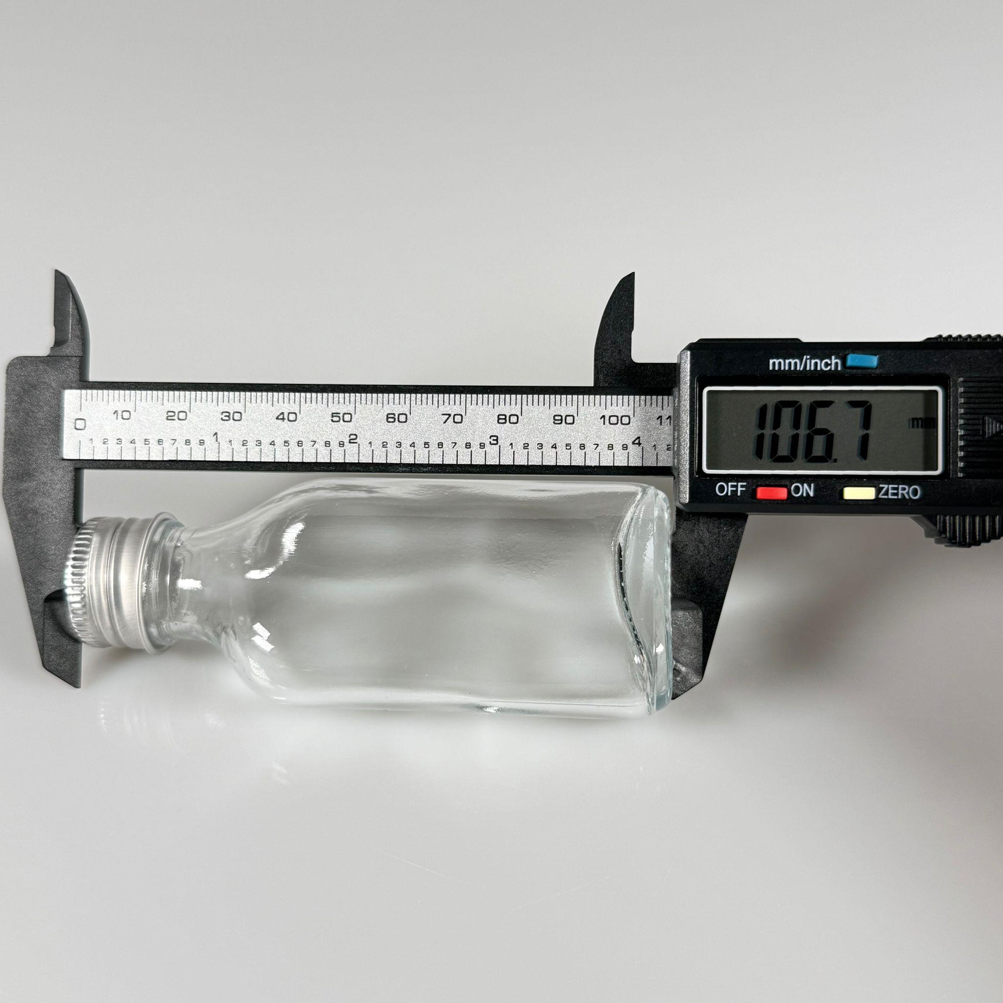 50 CC YASSI CAM ŞİŞE - GÜMÜŞ METAL KAPAKLI KOLONYA TIPALI - 50 ML COLD BREW KOLONYA CAM ŞİŞESİ (TIPA İLE KULLANMAK İÇİN KAPAK CONTASI ÇIKARILIR)