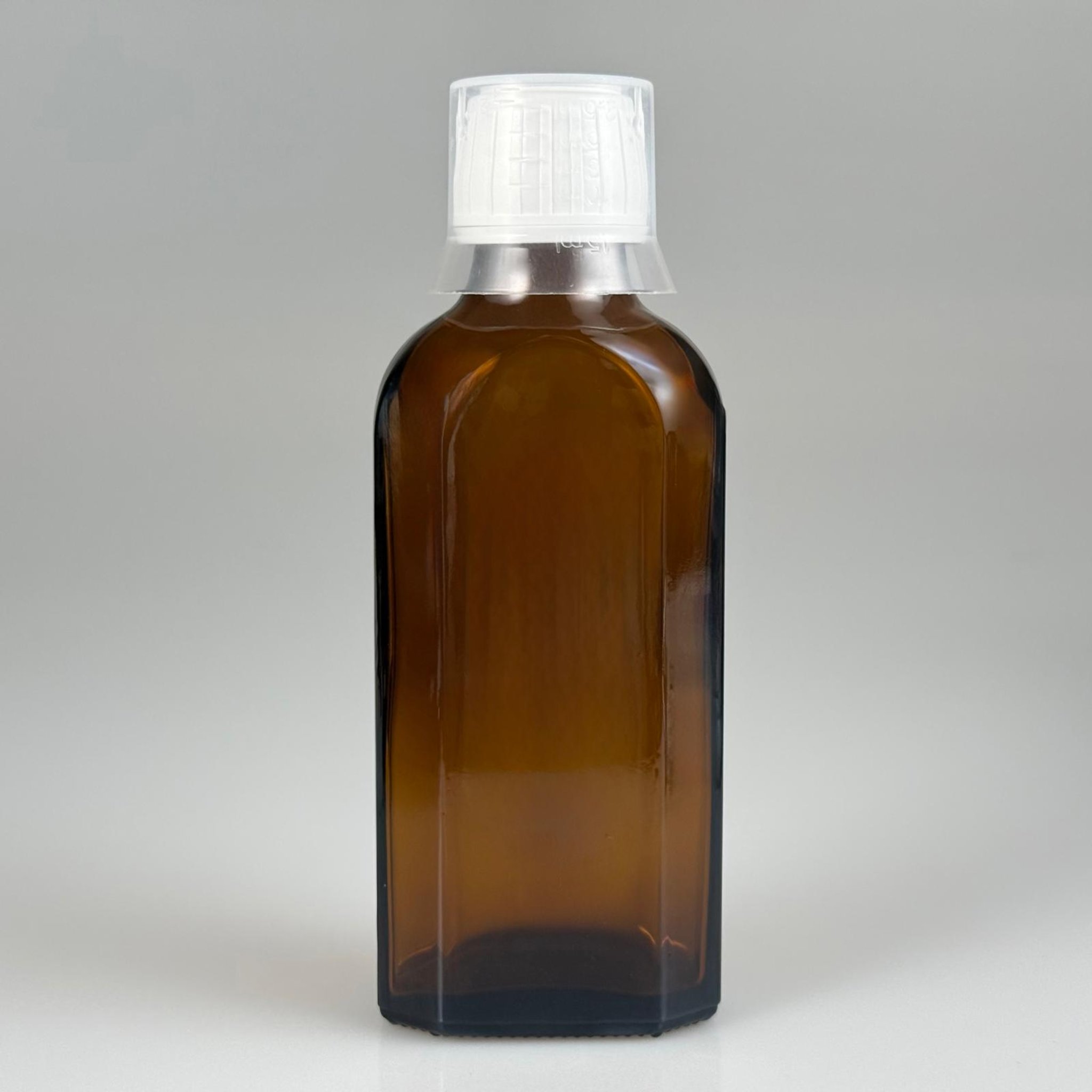 100 CC AMBER YASSI CAM ŞİŞE + BEYAZ KİLİTLİ ECZA KAPAK + 15 ML ÖLÇEK TAKIM 100 ML KAHVERENGİ YASSI MODEL CAM ŞİŞE
