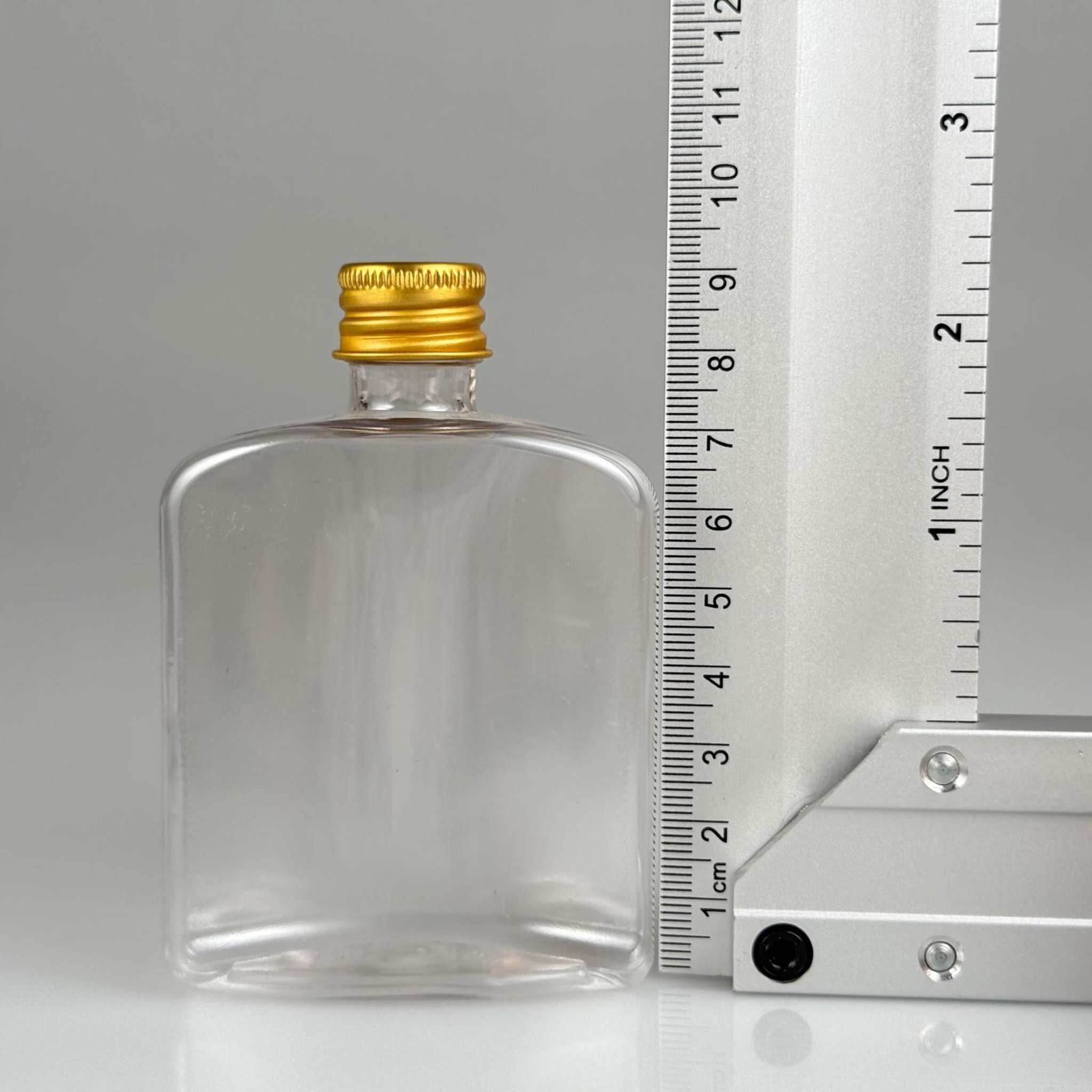100 CC ŞEFFAF YASSI PLASTİK PET ŞİŞE + KÖPÜK CONTALI GOLD ALÜMİNYUM METAL KAPAKLI TAKIM - 100 ML YASSI PET ŞİŞE