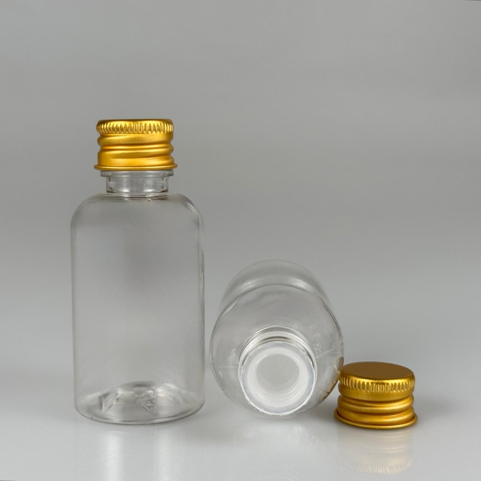 40 CC ŞEFFAF SİLİNDİR TOMBUL PET ŞİŞE + KÖPÜK CONTALI GOLD ALÜMİNYUM METAL KAPAKLI + KÖR TIPALI TAKIM - 40 ML PLASTİK ŞİŞE