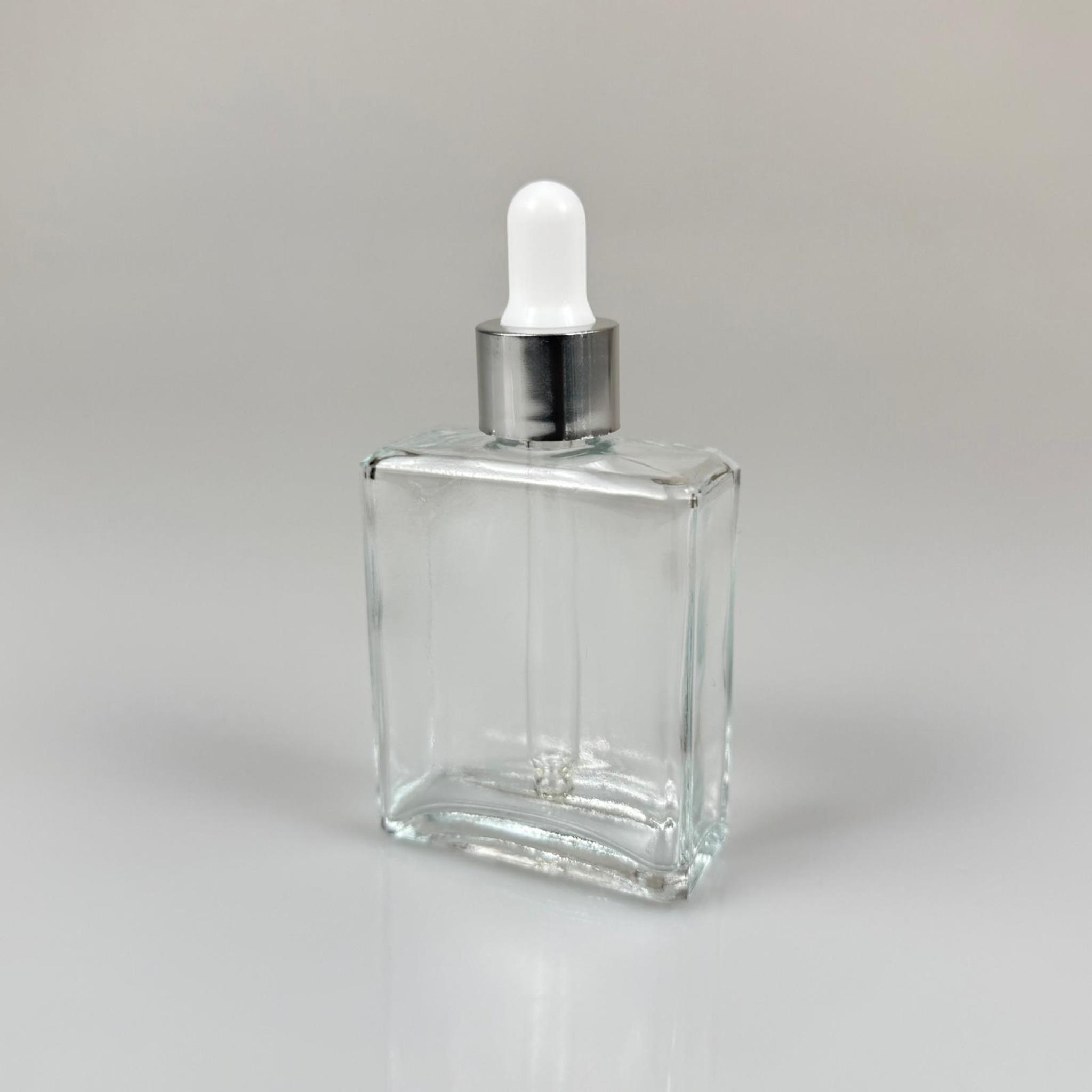 40 CC YASSI DİKDÖRTGEN KÖŞELİ KISA PRESTİJLİ CAM DAMLALIKLI ŞİŞE - BEYAZ EMZİK - GÜMÜŞ METALİK KAPAK - 40 ML CAM DAMLALIKLI ŞİŞE - DAMLALIKLI BOŞ ŞİŞE