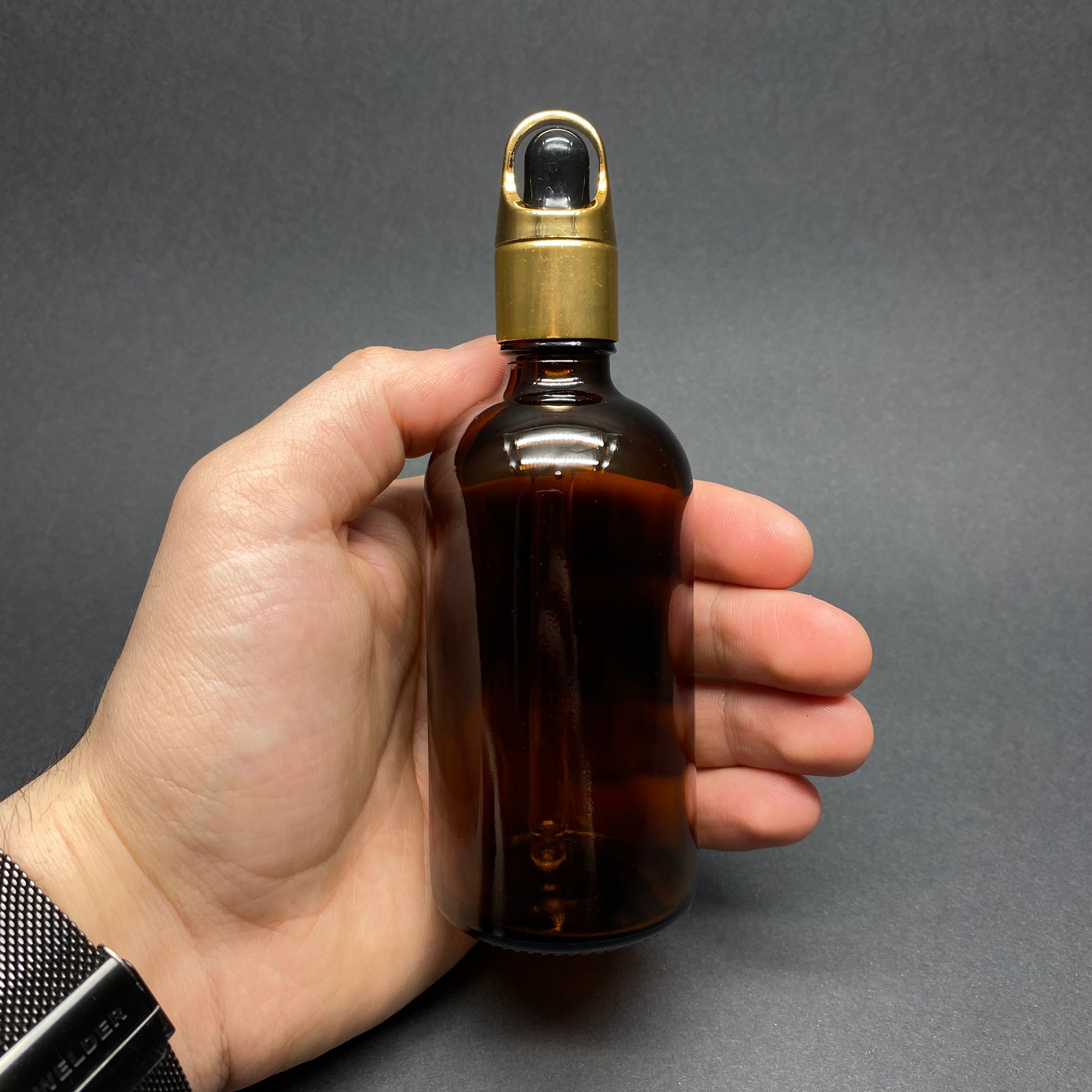 100 CC AMBER KAHVERENGİ CAM DAMLALIKLI ŞİŞE - SİYAH EMZİK - GOLD FLOWER SEPET MODEL METALİK KAPAK - 100 ML CAM DAMLALIKLI ŞİŞE