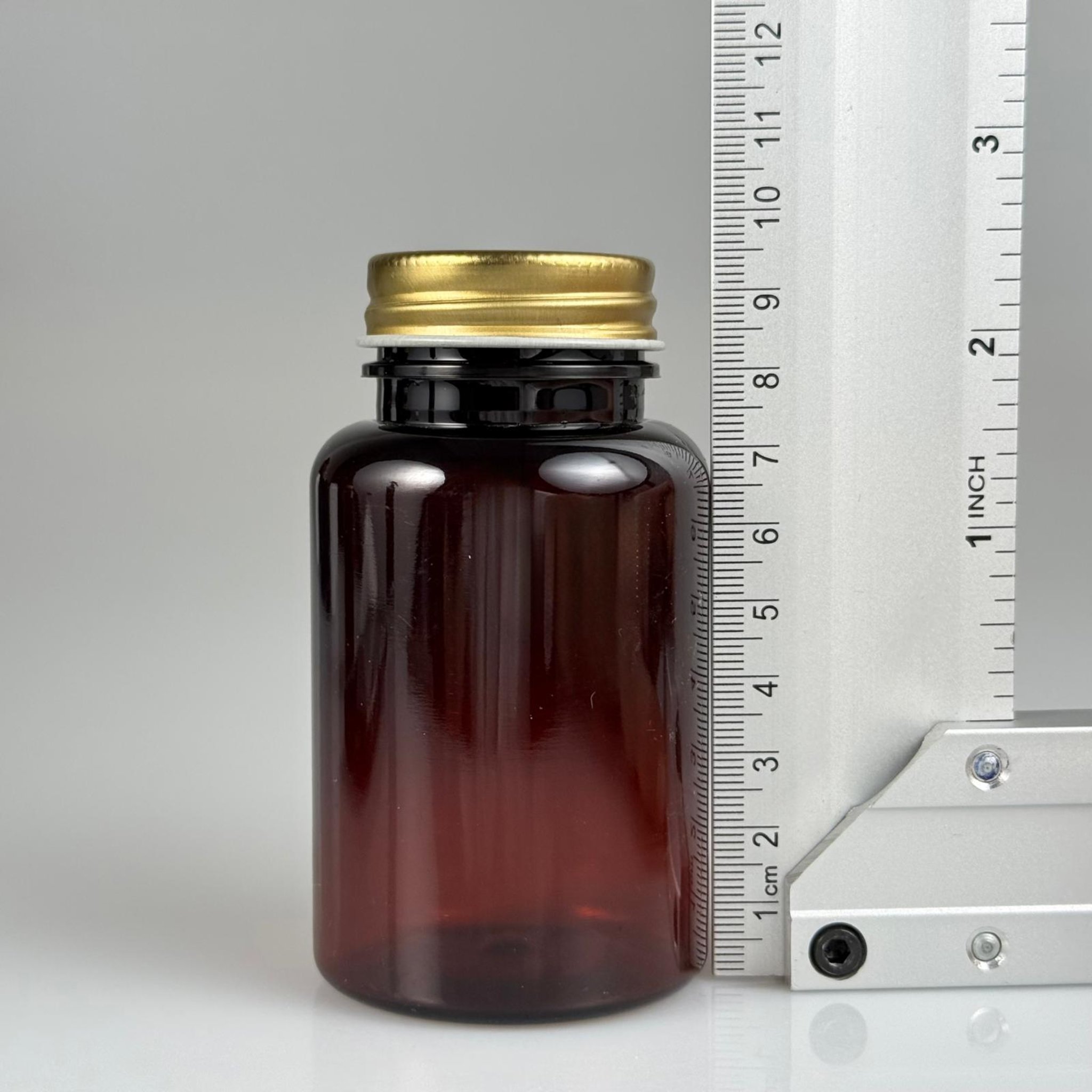 150 CC AMBER PET TABLET ŞİŞESİ - GOLD METAL KAPAKLI + KÖPÜK CONTALI 150 ML KAPSÜL KUTUSU - İLAÇ ŞİŞESİ - MEDİKAL HAP ŞİŞESİ - FARMASÖTİK KAVANOZ