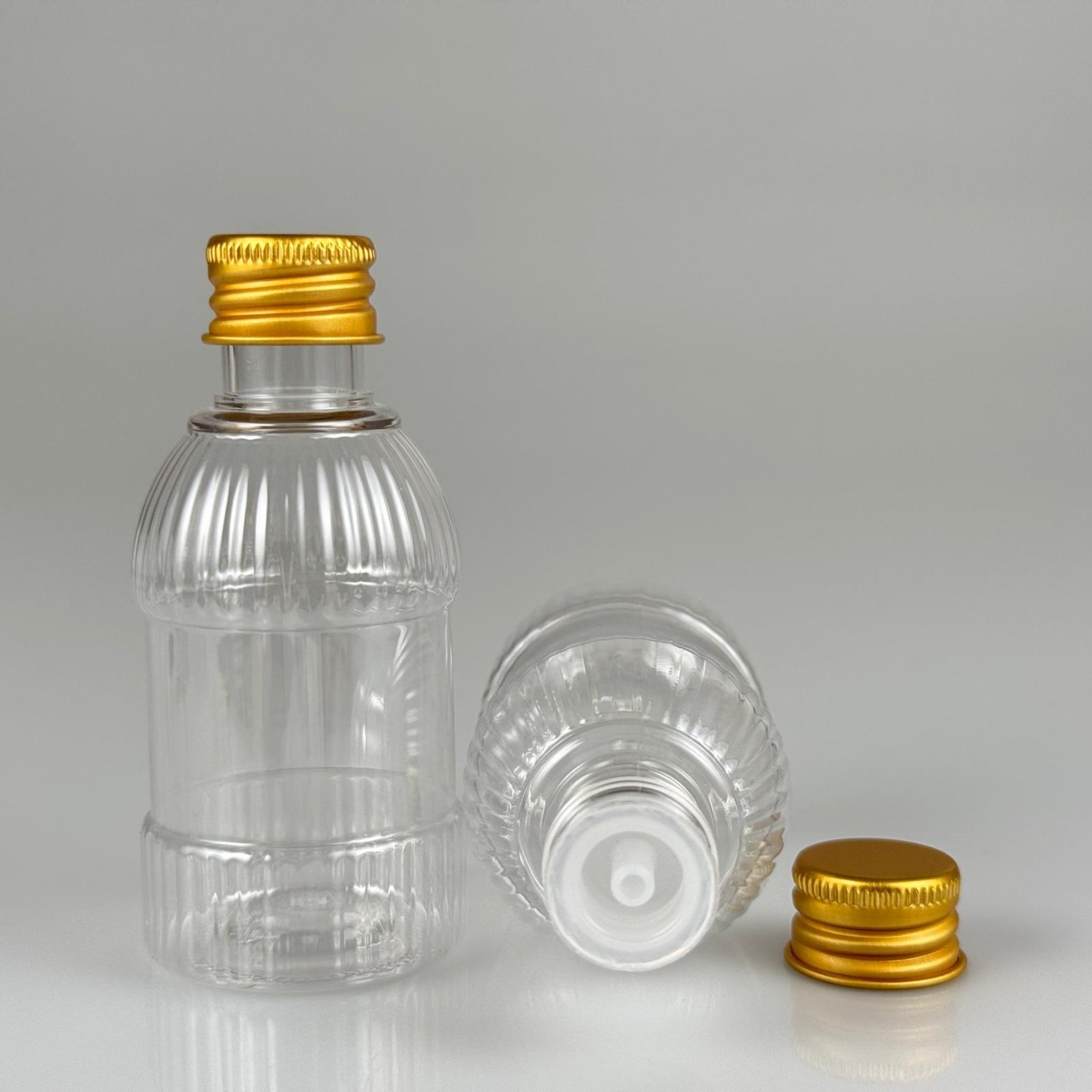50 CC MANDALİNA MODEL PET ŞİŞE + KÖPÜK CONTALI GOLD ALÜMİNYUM METAL KAPAKLI + KOLONYA TIPALI TAKIM - 50 ML TOMBUL PET ŞİŞE