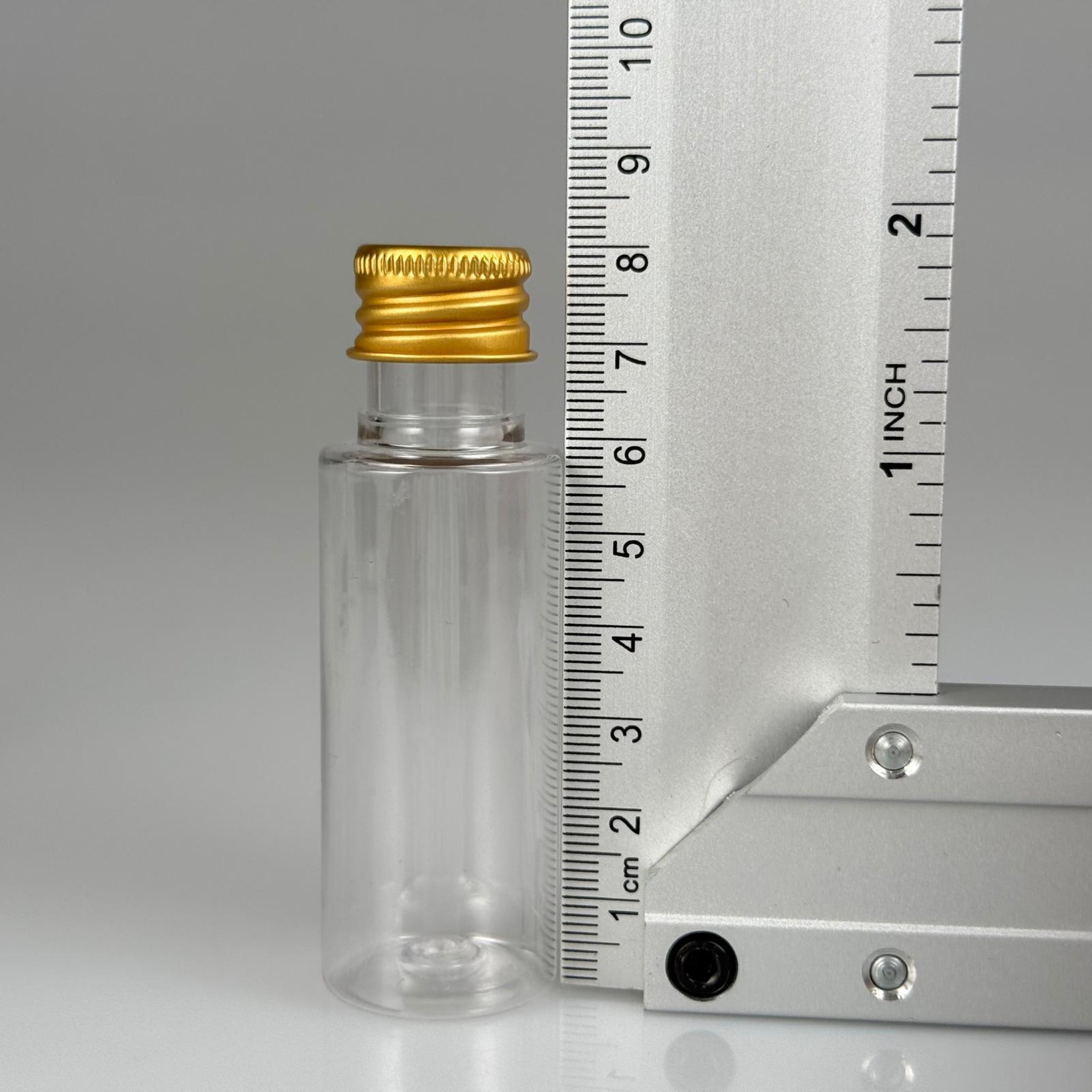 30 CC ŞEFFAF SİLİNDİR UZUN MODEL PET ŞİŞE + KÖPÜK CONTALI GOLD ALÜMİNYUM METAL KAPAKLI + DAMLALIKLI KOLONYA TIPALI TAKIM - 30 ML PLASTİK ŞİŞE