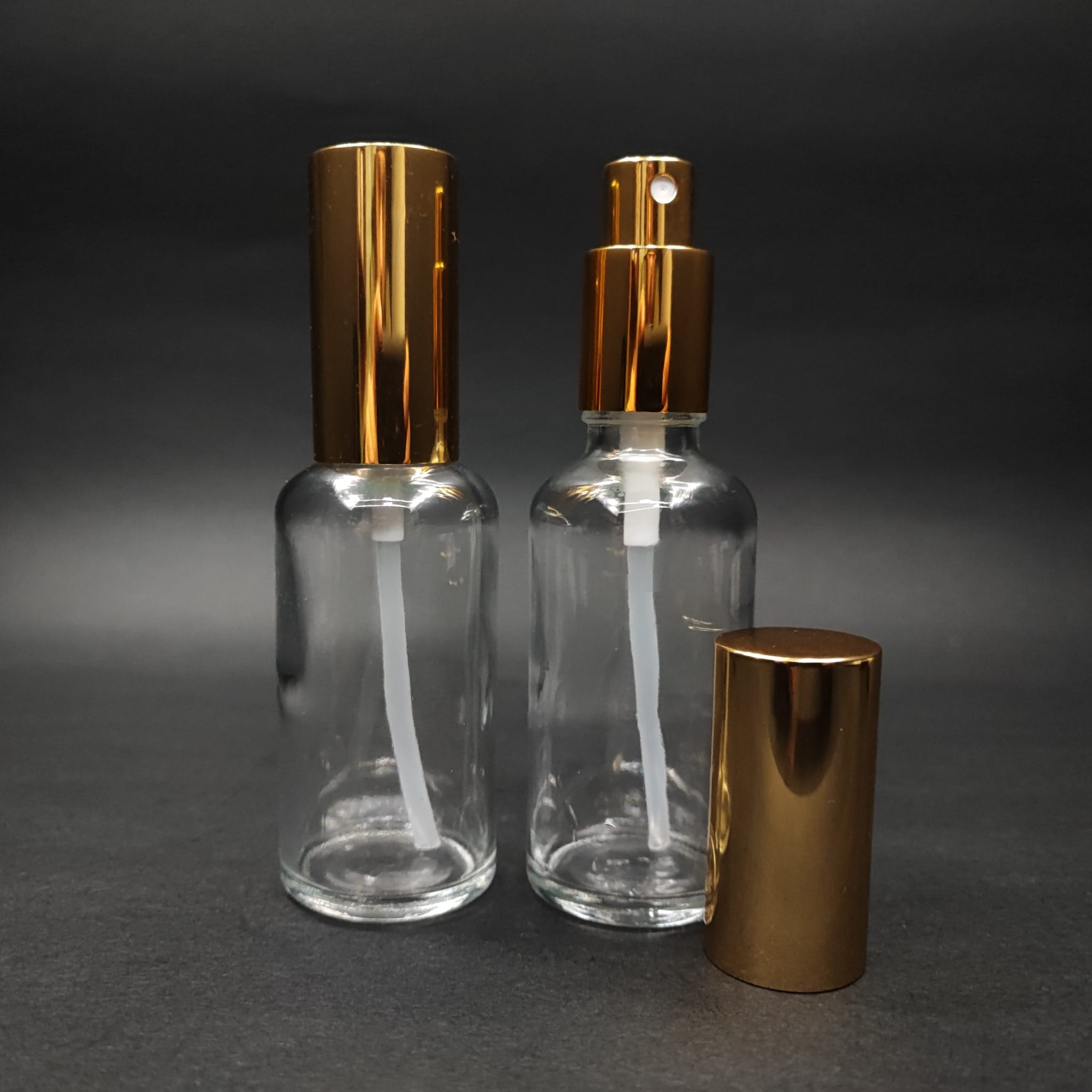 50 ML LÜKS VİDALI VALF ÇEVİRME PARFÜM ŞİŞELERİ - 50 CC ŞEFFAF CAM ŞİŞE - GOLD METAL SPREYLİ KAPAKLI SET