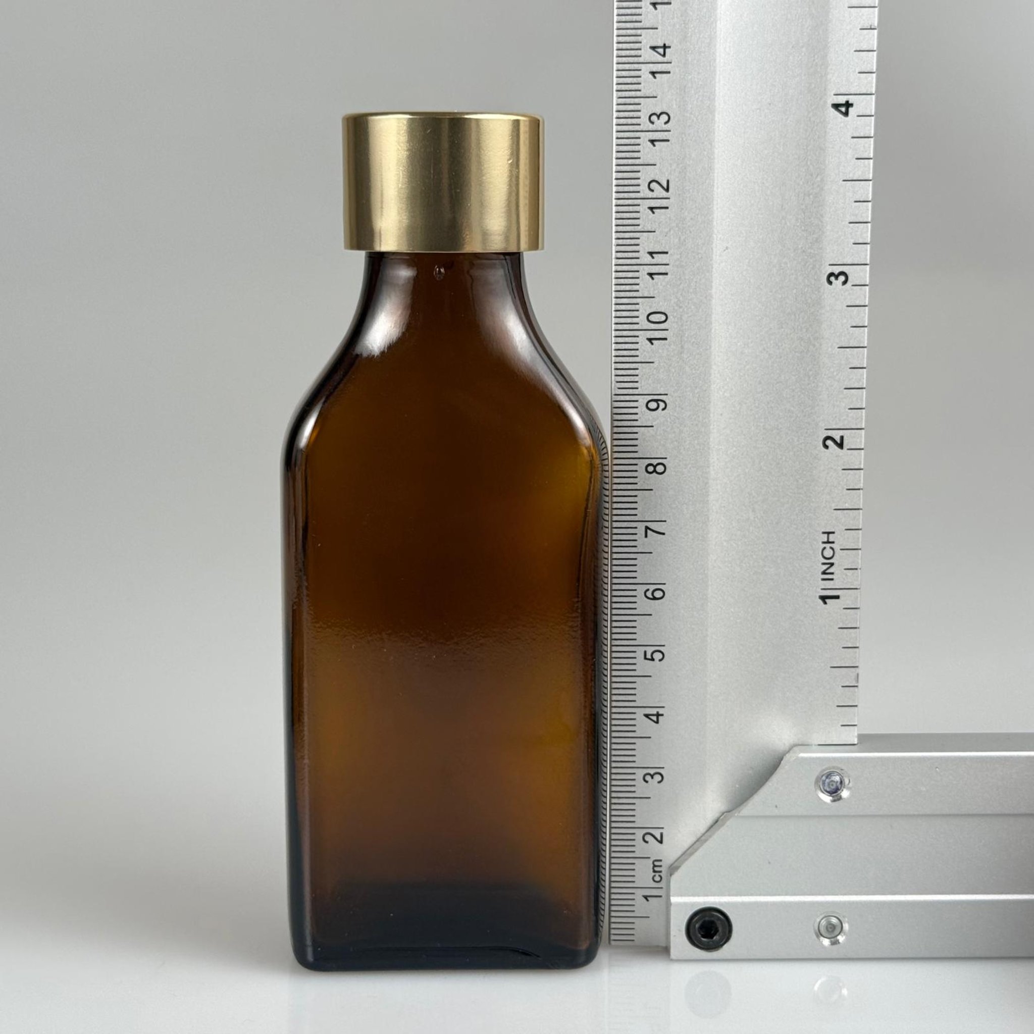 100 CC AMBER YASSI CAM ŞİŞE + ALÜMİNYUM KAPLAMALI GOLD KAPAKLKI + KÖR TIPALI TAKIM - 100 ML KAYVERENGİ CAM ŞİŞE