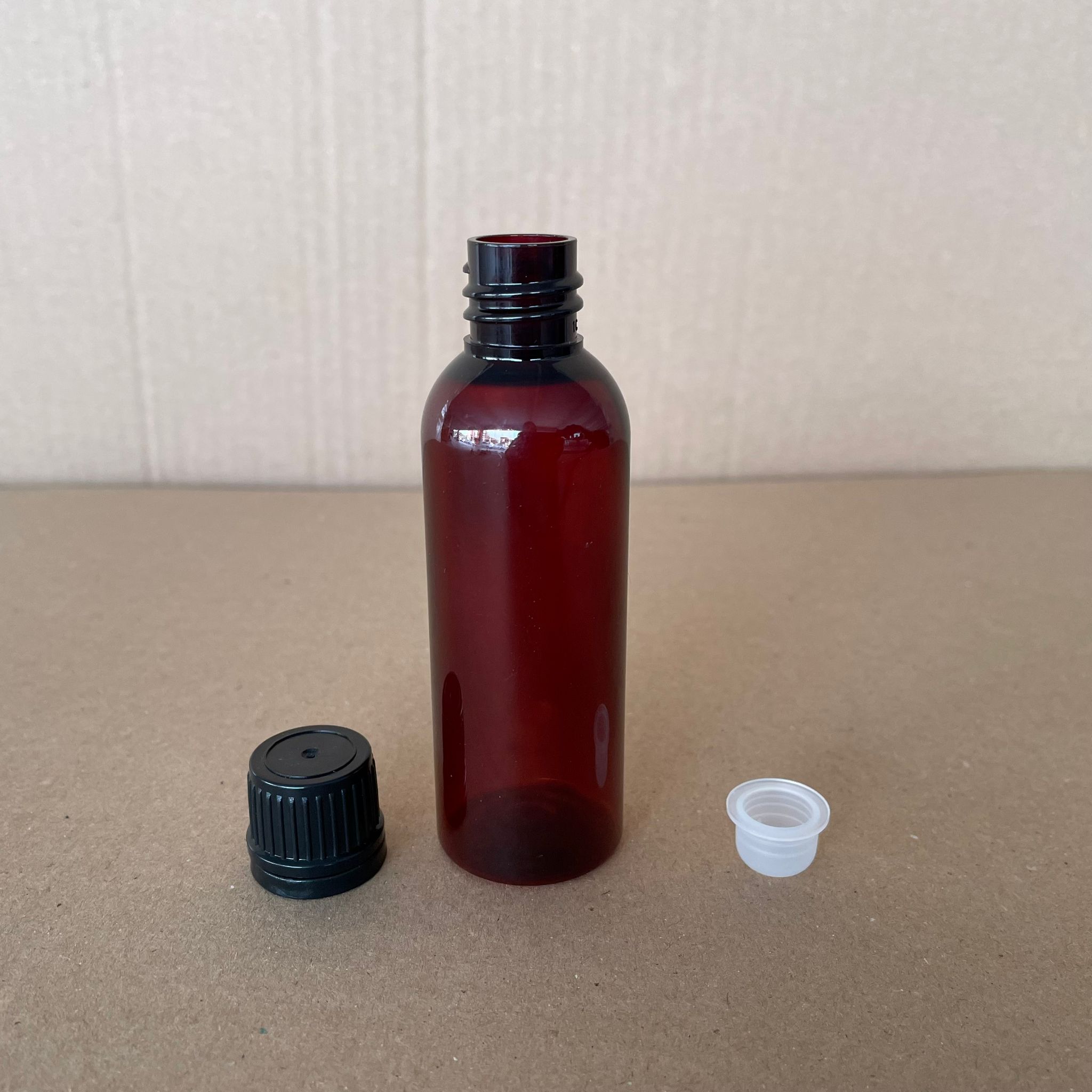 50 CC KALIN AMBER PET ŞİŞE (8 GR) - SİYAH KAPAKLI + KÖR TIPALI - 50 ML KAHVERENGİ PLASTİK ŞİŞE