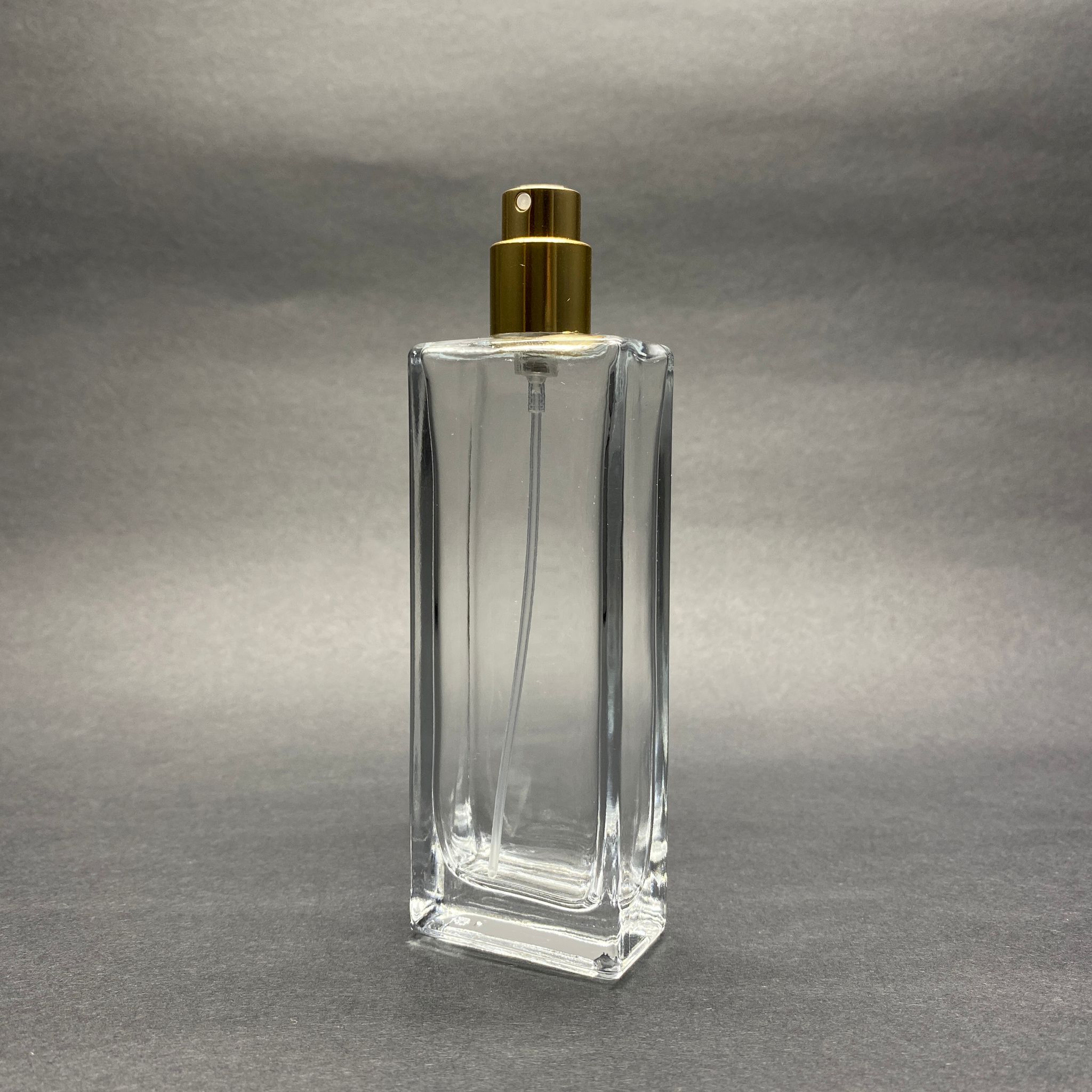 50 ML DİKDÖRTGEN MODEL FORTUNE UZUN PARFÜM ŞİŞESİ - GOLD METAL SPREYLİ (AĞIZ 15 MM GEÇME KOLAY KAPAMA)