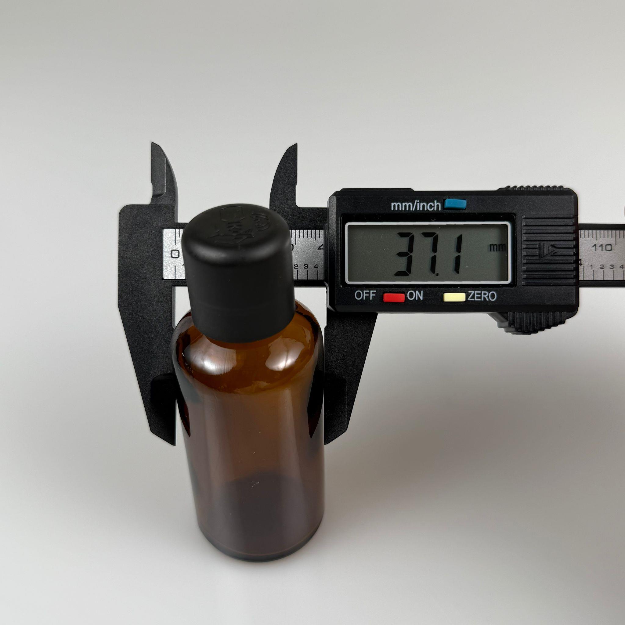 50 CC AMBER CAM ŞİŞE + İÇTEN DAMLALIKLI ÇOCUK KİLİTLİ SİYAH KAPAK - KAHVERENGİ 50 ML KİLİT KAPAKLI DAMLATMALI ŞİŞE