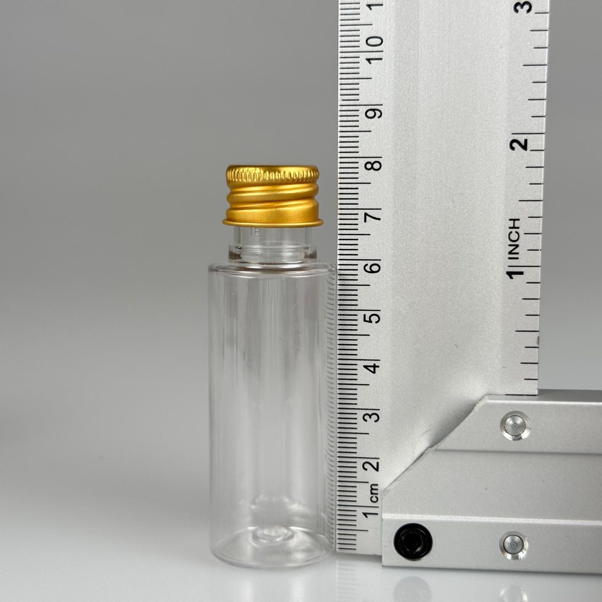 30 CC ŞEFFAF SİLİNDİR UZUN MODEL PET ŞİŞE + KÖPÜK CONTALI GOLD ALÜMİNYUM METAL KAPAKLI TAKIM - 30 ML PLASTİK ŞİŞE