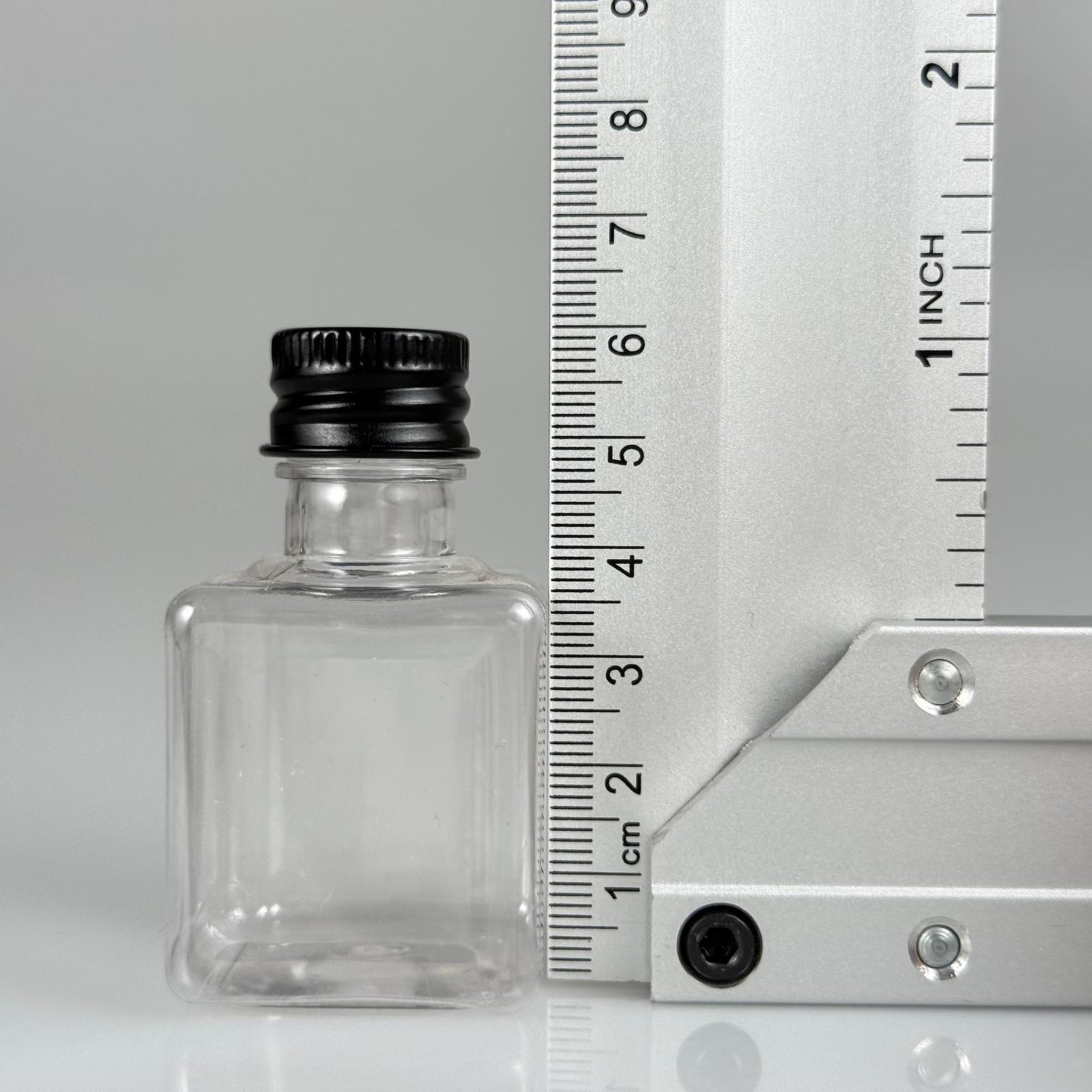 35 CC ŞEFFAF KARE PET ŞİŞE - KÖPÜK CONTALI SİYAH ALÜMİNYUM METAL KAPAKLI + KÖR TIPALI TAKIM - 35 ML ŞEFFAF KARE PET ŞİŞE
