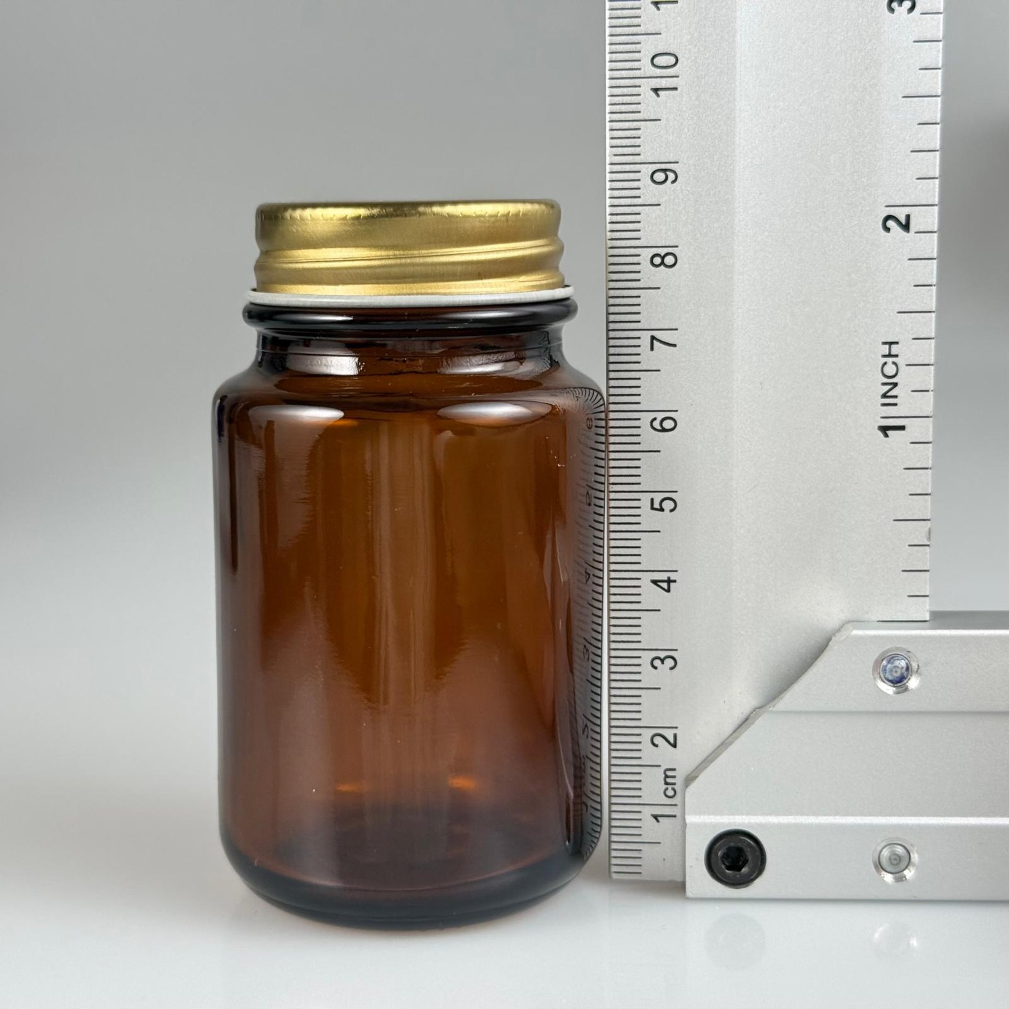 95 CC AMBER CAM TABLET ŞİŞESİ - GOLD METAL KAPAKLI + KÖPÜK CONTALI - 95 ML KAPSÜL ŞİŞESİ - GENİŞ AĞIZLI İLAÇ ŞİŞESİ - TABLET KAVANOZU - ŞİŞECAM KODU 763910
