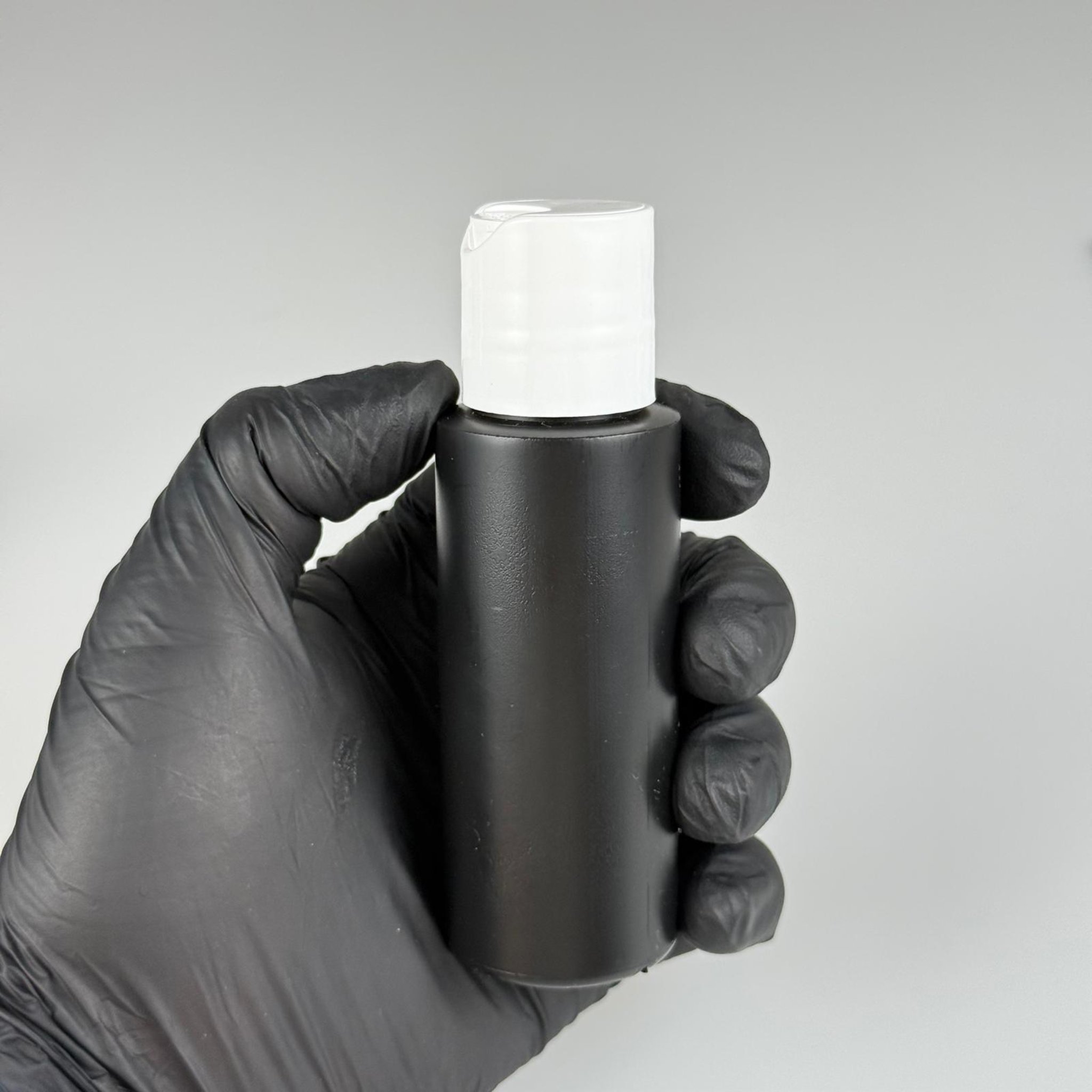 50 CC SİYAH POLİETİLEN ŞAMPUAN ŞİŞESİ -  50 ML BEYAZ DİSKTOP ŞAMPUAN KAPAKLI