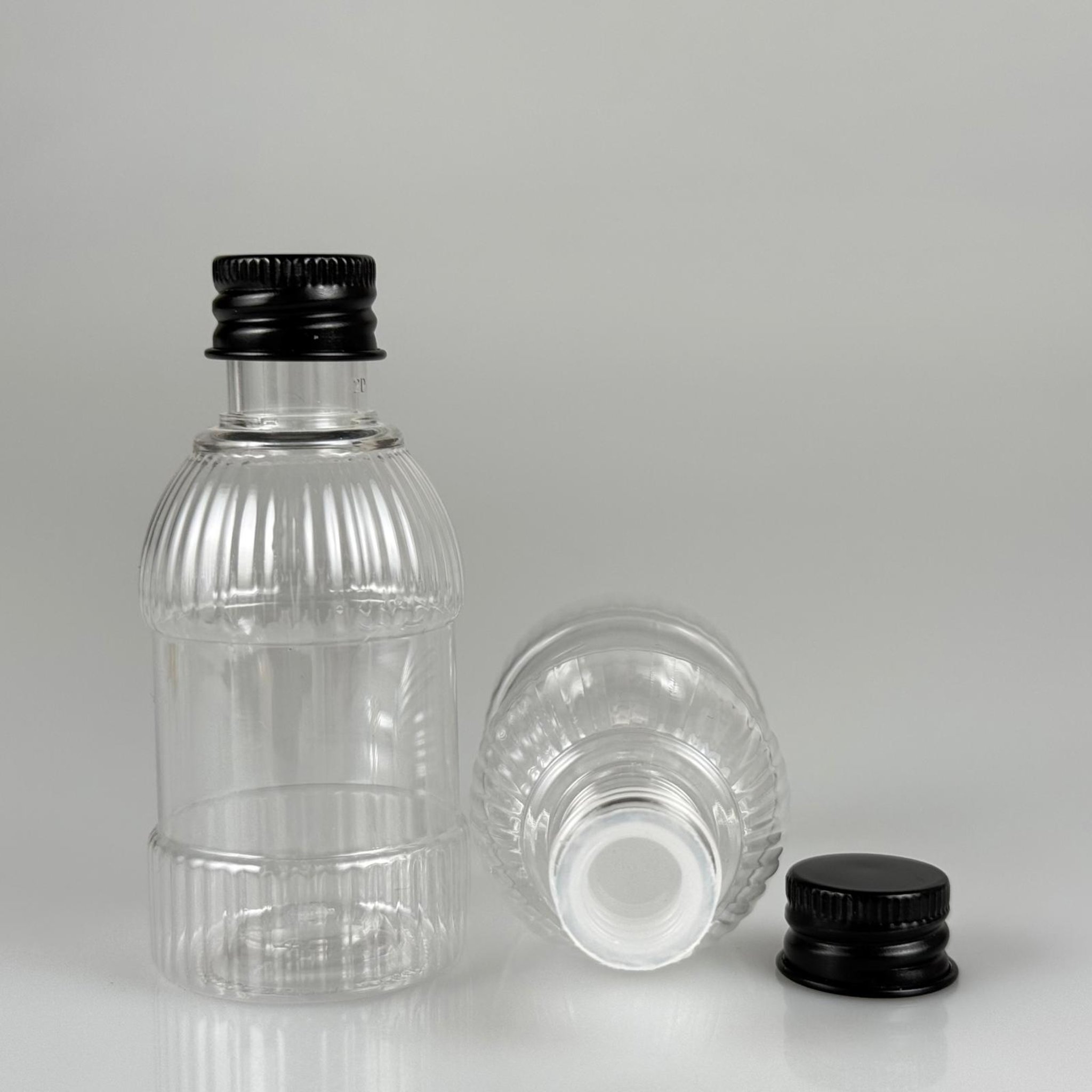 50 CC MANDALİNA MODEL PET ŞİŞE + KÖPÜK CONTALI SİYAH ALÜMİNYUM METAL KAPAKLI + KÖR TIPALI TAKIM - 50 ML TOMBUL PET ŞİŞE