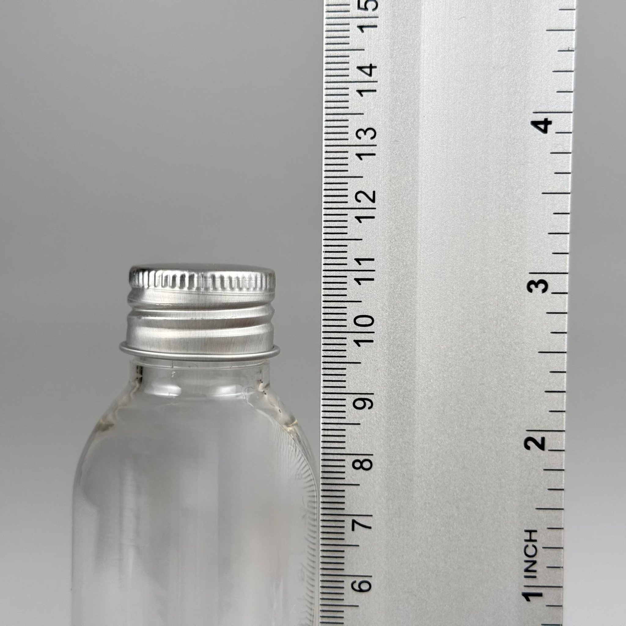 100 CC SİLİNDİR OVAL MODEL ŞEFFAF SERT PET ŞİŞE (24 AĞIZ) + KÖPÜK CONTALI GÜMÜŞ METAL ALÜMİNYUM KAPAK + KOLONYA TIPALI TAKIM - 100 ML KAPAKLI KALIN PLASTİK ŞEFFAF ŞİŞELER
