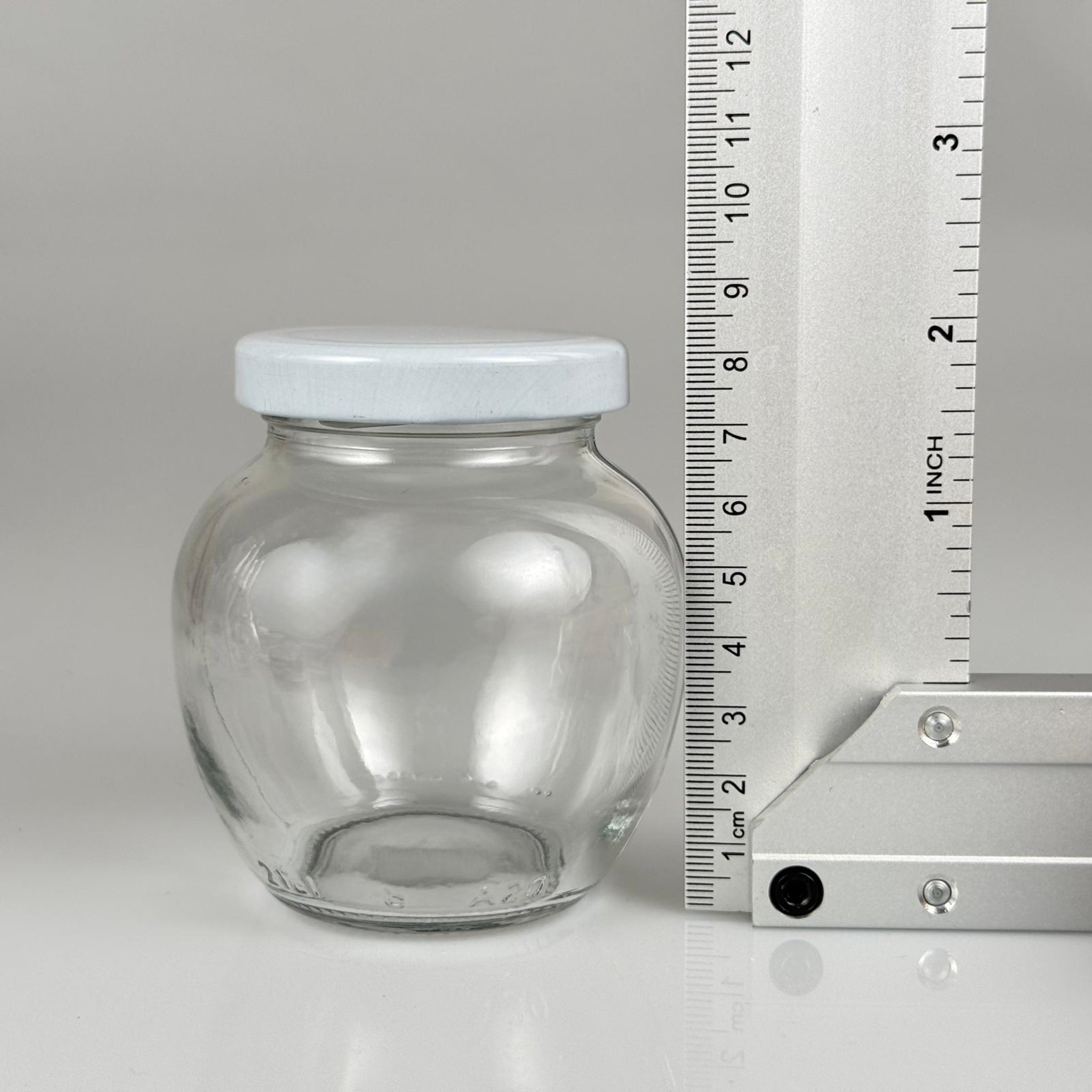210 CC YUMURTA KAVANOZ + BEYAZ METAL KAPAKLI + KENDİNDEN YAPIŞKANLI KÖPÜK CONTALI TAKIM - 210 ML OVAL TİP CAM KAVANOZ