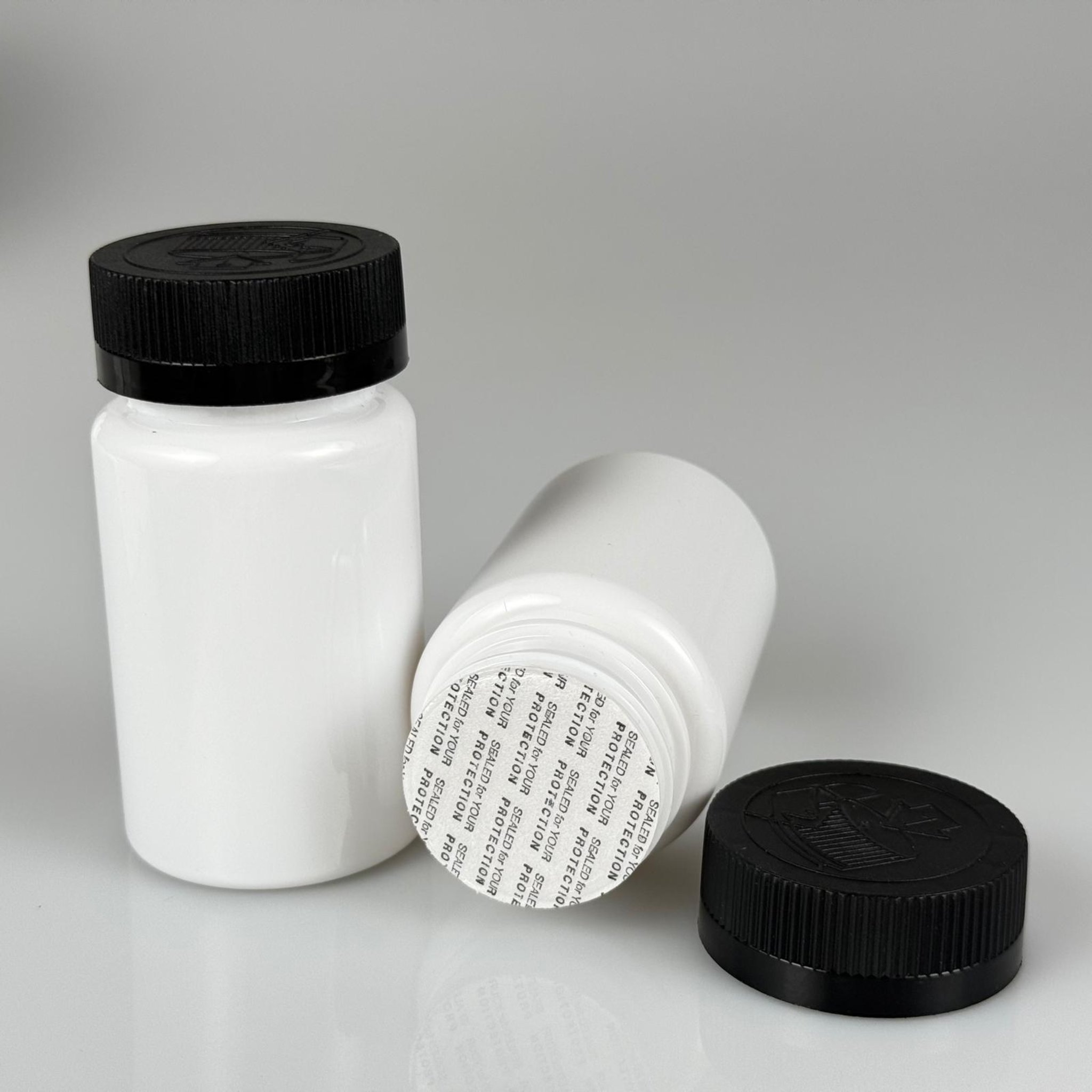 100 ML CONTALI ÇOCUK KİLİT KAPAKLI TABLET ŞİŞESİ  - 100 CC BEYAZ PET KAVANOZ + 38 MM SİYAH ÇOCUK KİLİTLİ KAPAK + KENDİNDEN YAPIŞKANLI KÖPÜK CONTA TAKIM -  KAPSÜL KUTUSU - İLAÇ ŞİŞESİ - MEDİKAL HAP ŞİŞESİ - FARMASÖTİK KAVANOZ