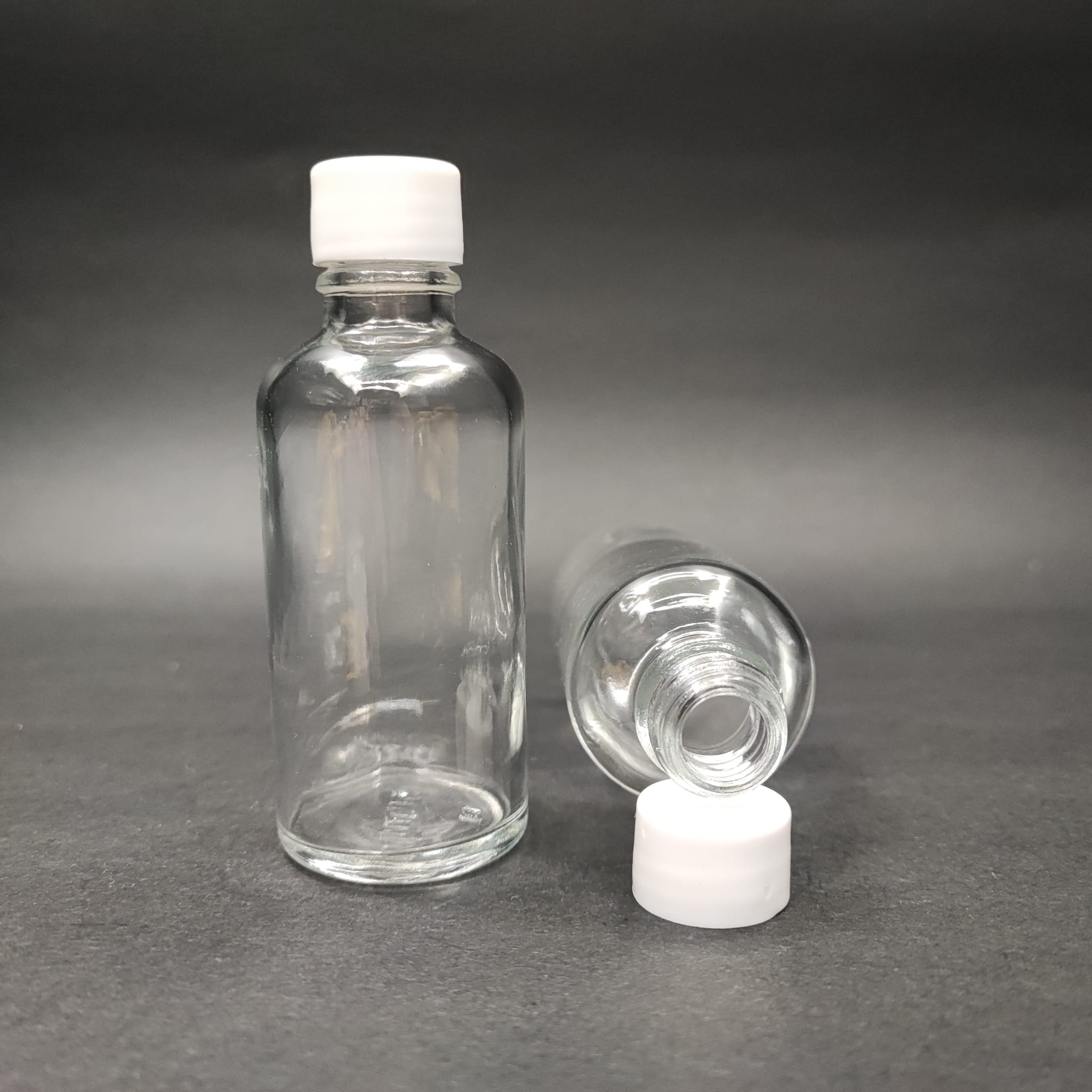 50 CC ŞEFFAF CAM ŞİŞE + KENDİNDEN CONTALI SIZDIRMAZ BEYAZ KAPAK - 50 ML KAPAKLI CAM ŞİŞE