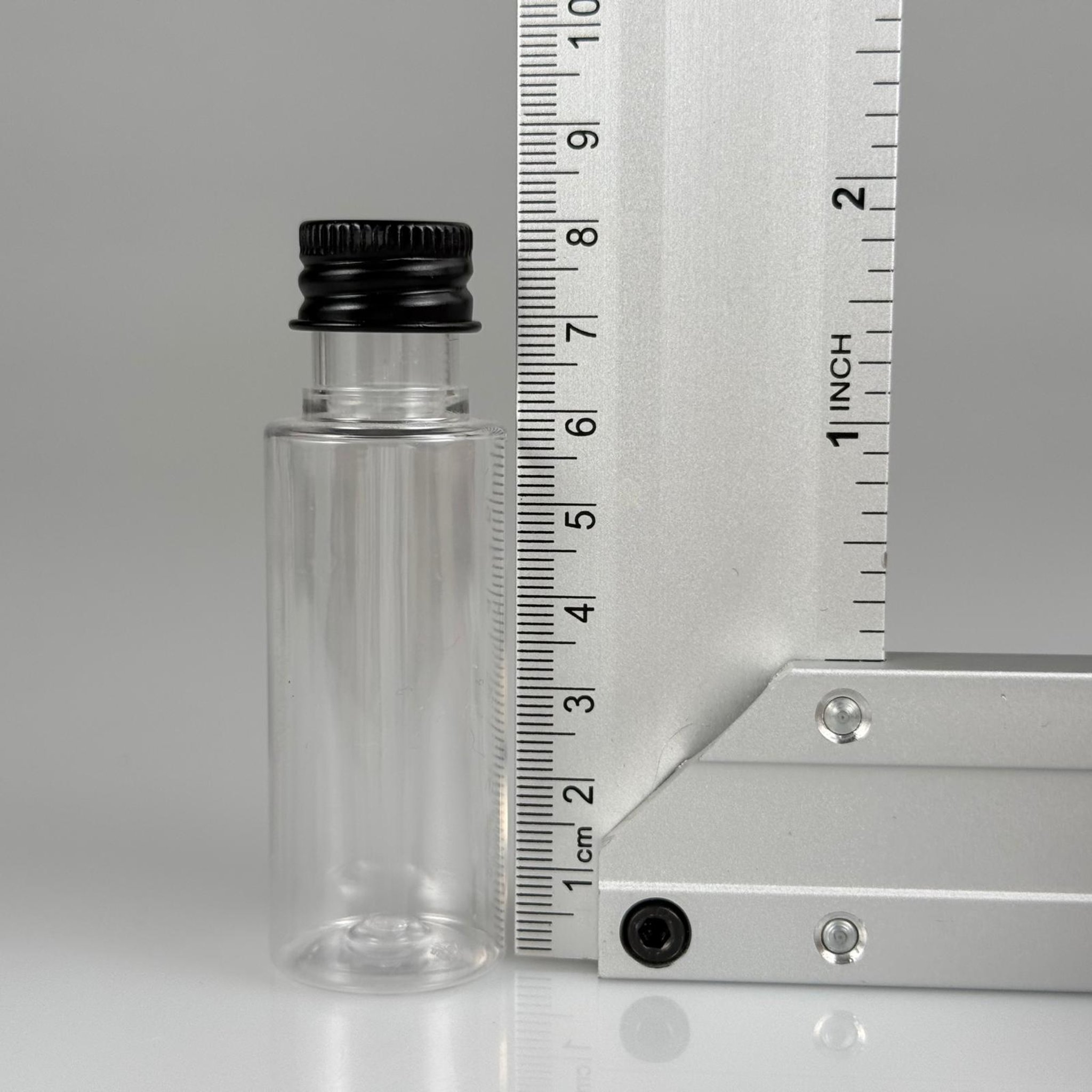 30 CC ŞEFFAF SİLİNDİR UZUN MODEL PET ŞİŞE + KÖPÜK CONTALI SİYAH ALÜMİNYUM METAL KAPAKLI + KÖR TIPALI TAKIM - 30 ML PLASTİK ŞİŞE