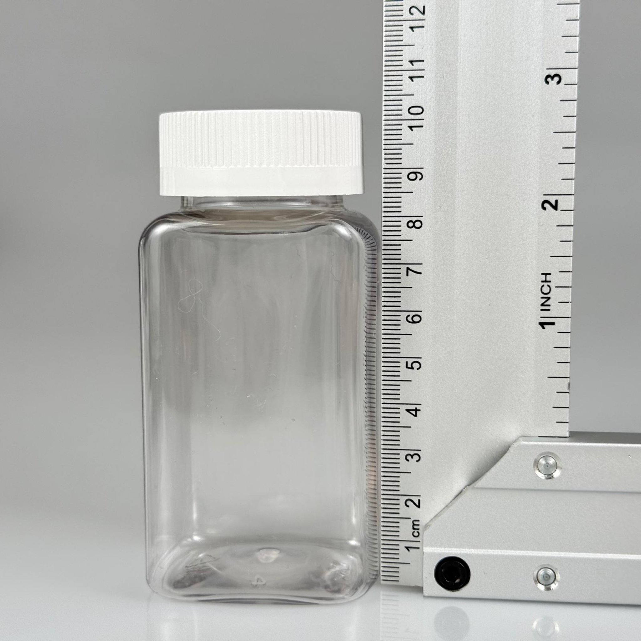 150 ML CONTALI ÇOCUK KİLİT KAPAKLI KARE TABLET ŞİŞESİ  - 150 CC ŞEFFAF PET KAVANOZ + 38 MM BEYAZ ÇOCUK KİLİTLİ KAPAK + KENDİNDEN YAPIŞKANLI KÖPÜK CONTA TAKIM -  KAPSÜL KUTUSU - İLAÇ ŞİŞESİ - MEDİKAL HAP ŞİŞESİ - FARMASÖTİK KAVANOZ