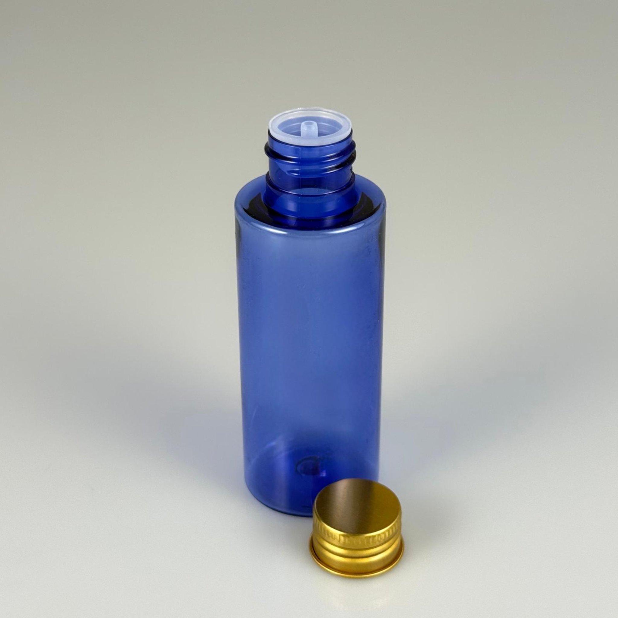 100 CC MAVİ SİLİNDİR KESKİN KÜT MODEL SERT PET ŞİŞE (17 GR - 24 AĞIZ ) + KÖPÜK COMTALI GOLD METAL ALÜMİNYUM KAPAK + KOLONYA TIPALI TAKIM - 100 ML KAPAKLI MAVİ PET ŞİŞELER